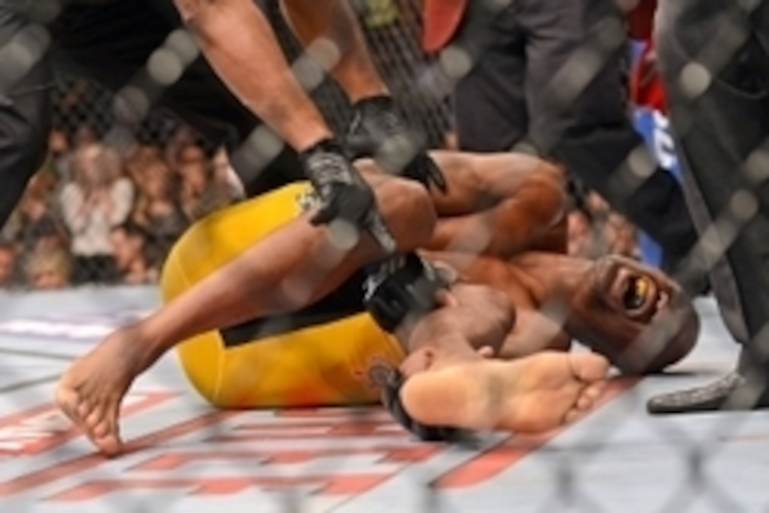 Dec 28, 2013; Las Vegas, NV, USA;    Anderson Silva reacts after breaking his leg on a kick to Chris Weidman (not pictured) during their UFC middleweight championship bout at the MGM Grand Garden Arena. Mandatory Credit: Jayne Kamin-Oncea-USA TODAY Sports