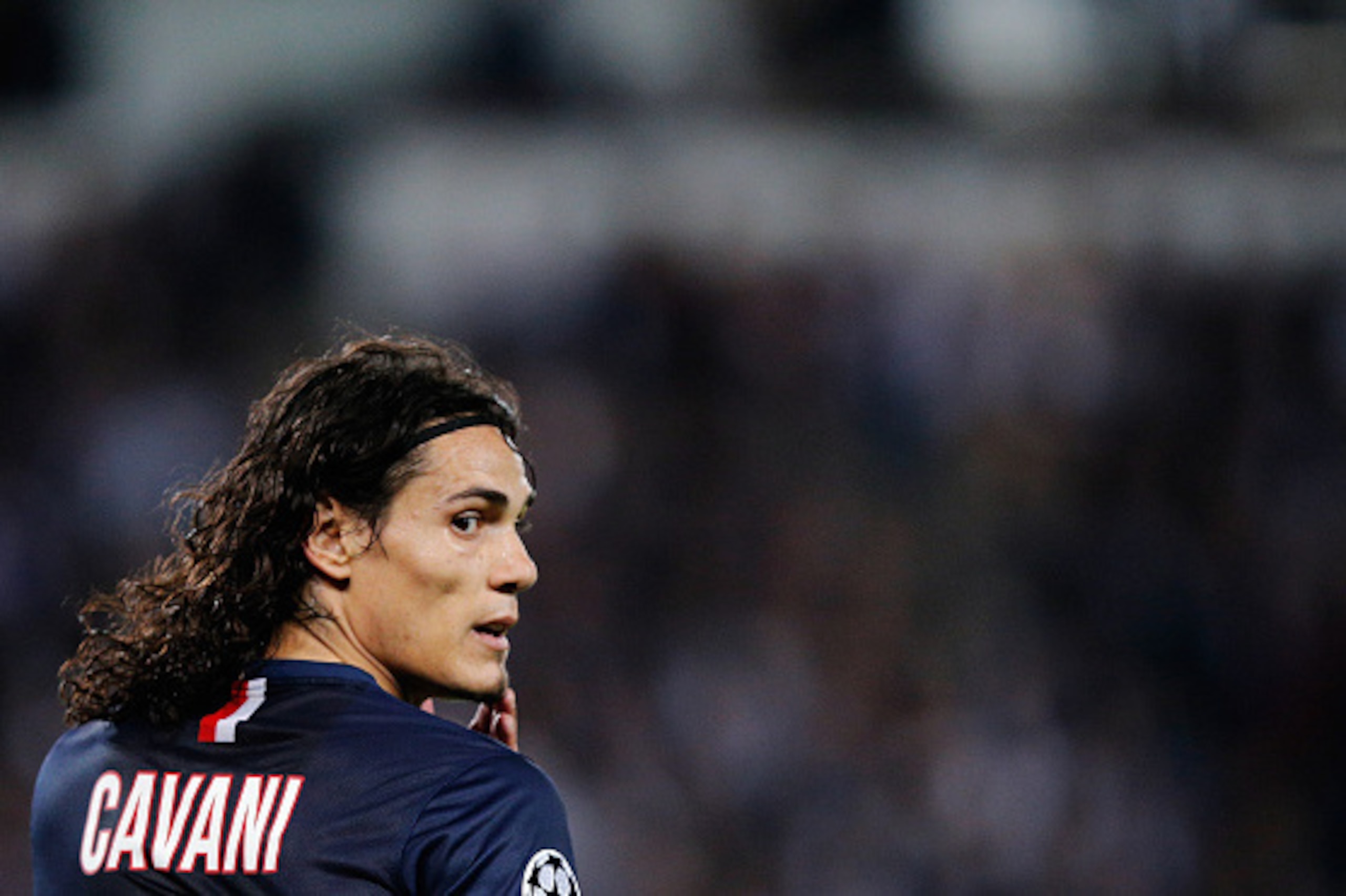 PARIS, FRANCE - SEPTEMBER 30:  Edinson Cavani of PSG waits for a corner to be taken during the Group F UEFA Champions League match between Paris Saint-Germain v FC Barcelona held at Parc des Princes on September 30, 2014 in Paris, France.  (Photo by Dean 