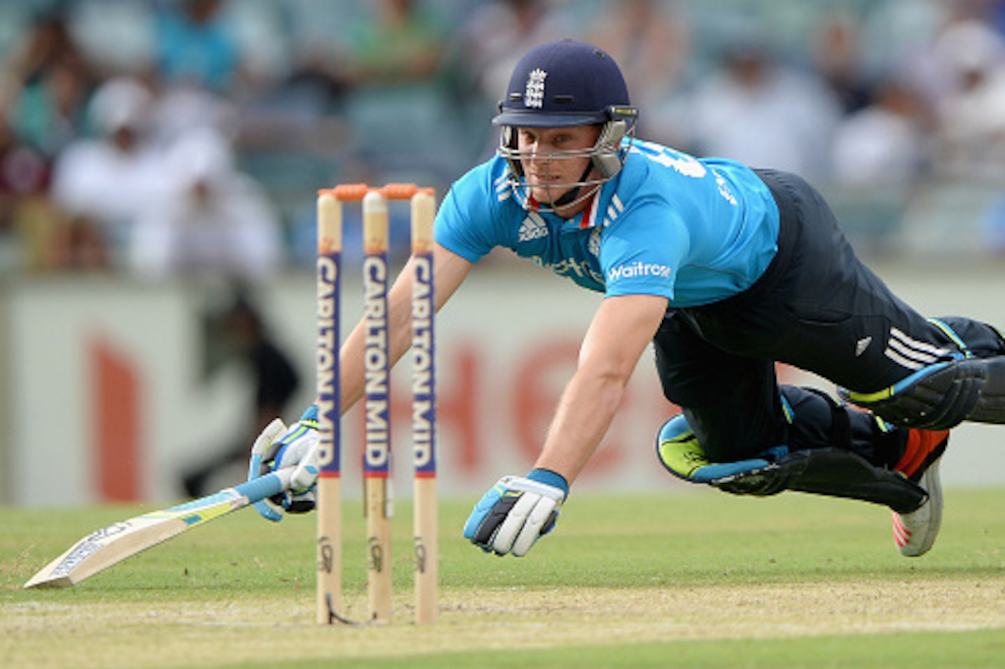 PERTH, AUSTRALIA - JANUARY 30:  Jos Buttler of England makes his ground during the One Day International match between England and India at WACA on January 30, 2015 in Perth, Australia.  (Photo by Gareth Copley/Getty Images)