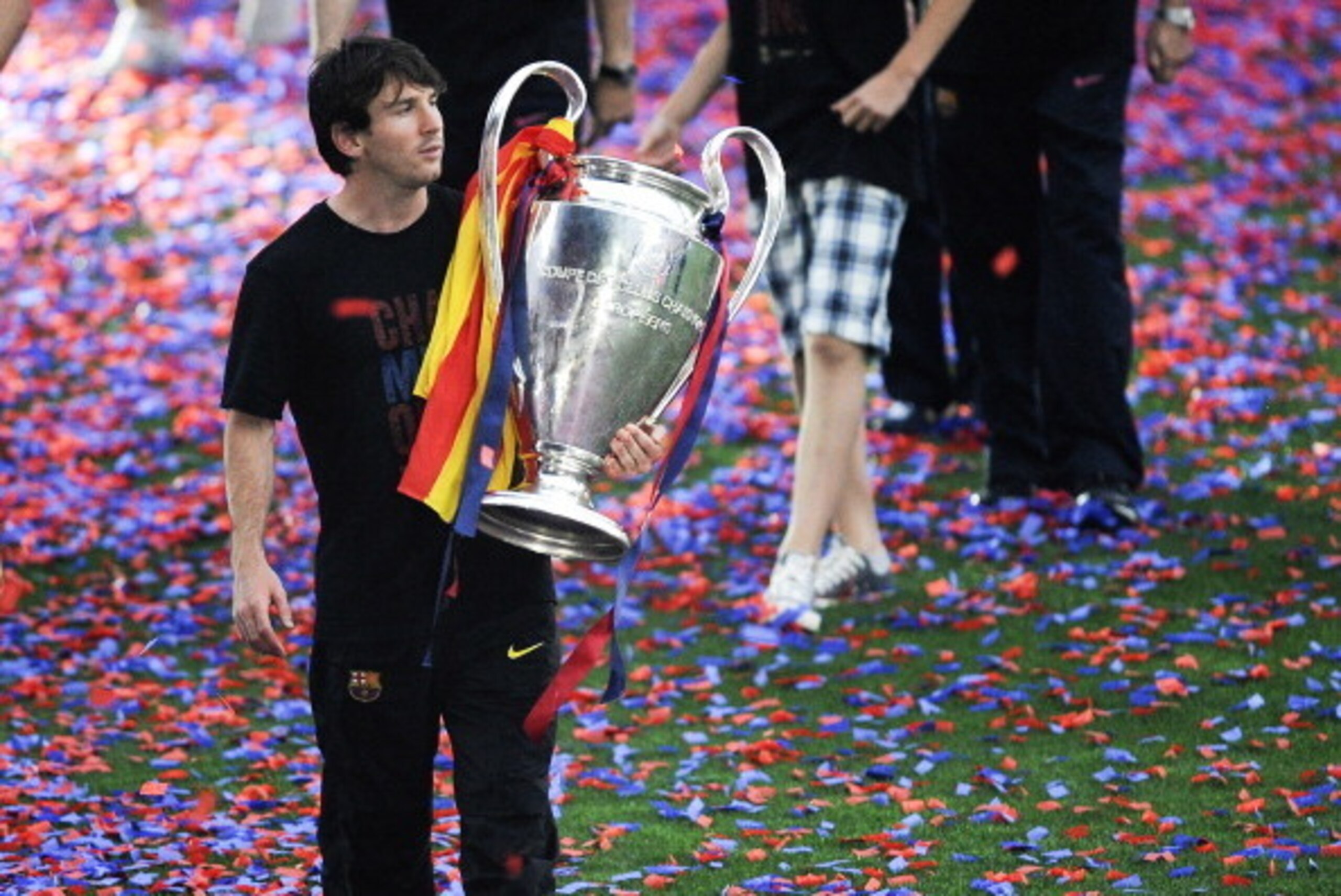 BARCELONA, SPAIN - MAY 29:  Lionel Messi of FC Barcelona holds the UEFA Champions League Trophy during the celebrations after winning the UEFA Champions League Final against Manchester United at Camp Nou Stadium on May 29, 2011 in Barcelona, Spain.  (Phot