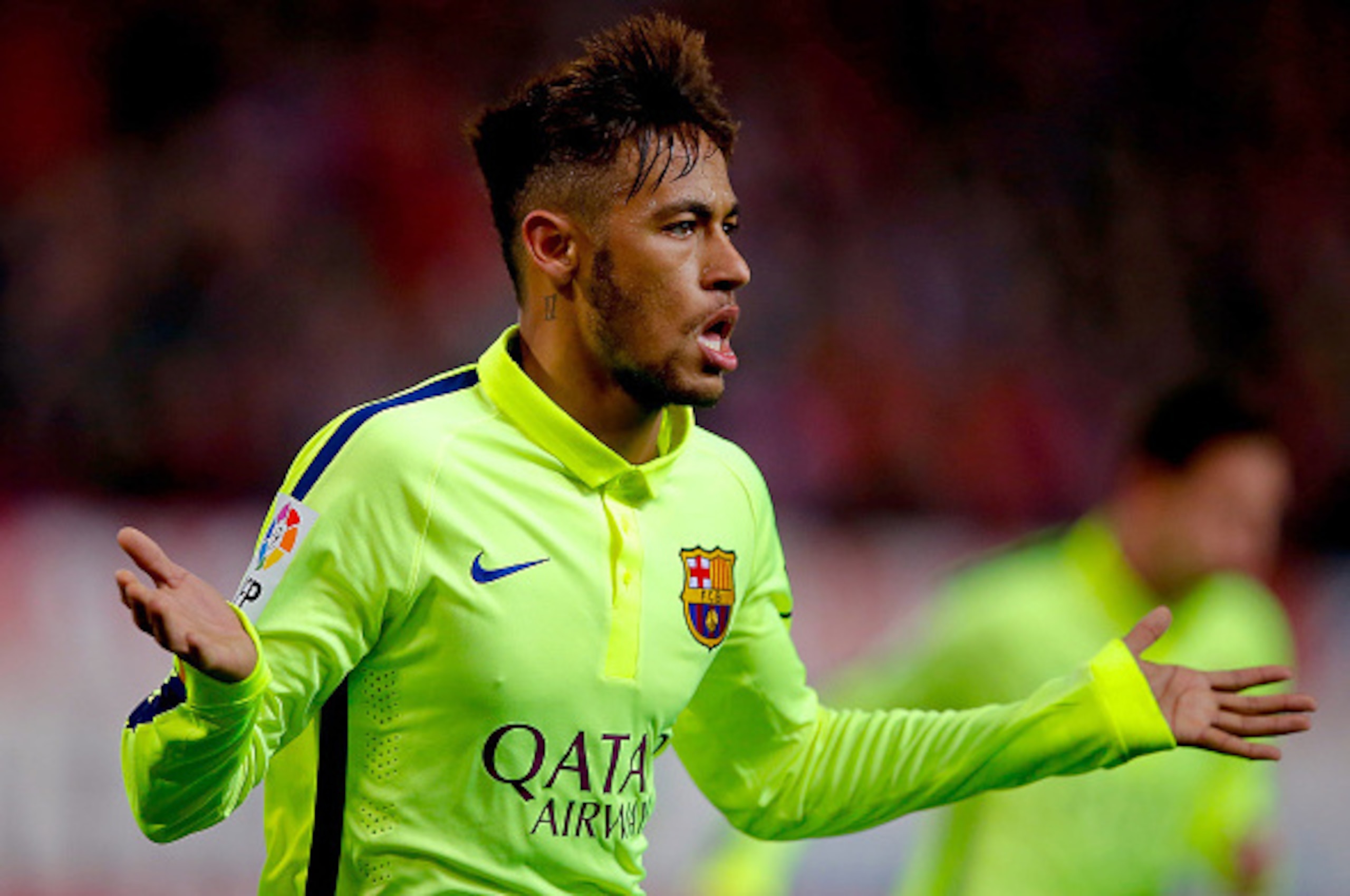 MADRID, SPAIN - JANUARY 28:  Neymar JR. of FC Barcelona celebrates scoring their third goal during the Copa del Rey Round of 8 second leg match between Club Atletico de Madrid and FC Barcelona at Vicente Calderon Stadium on January 28, 2015 in Madrid, Spa