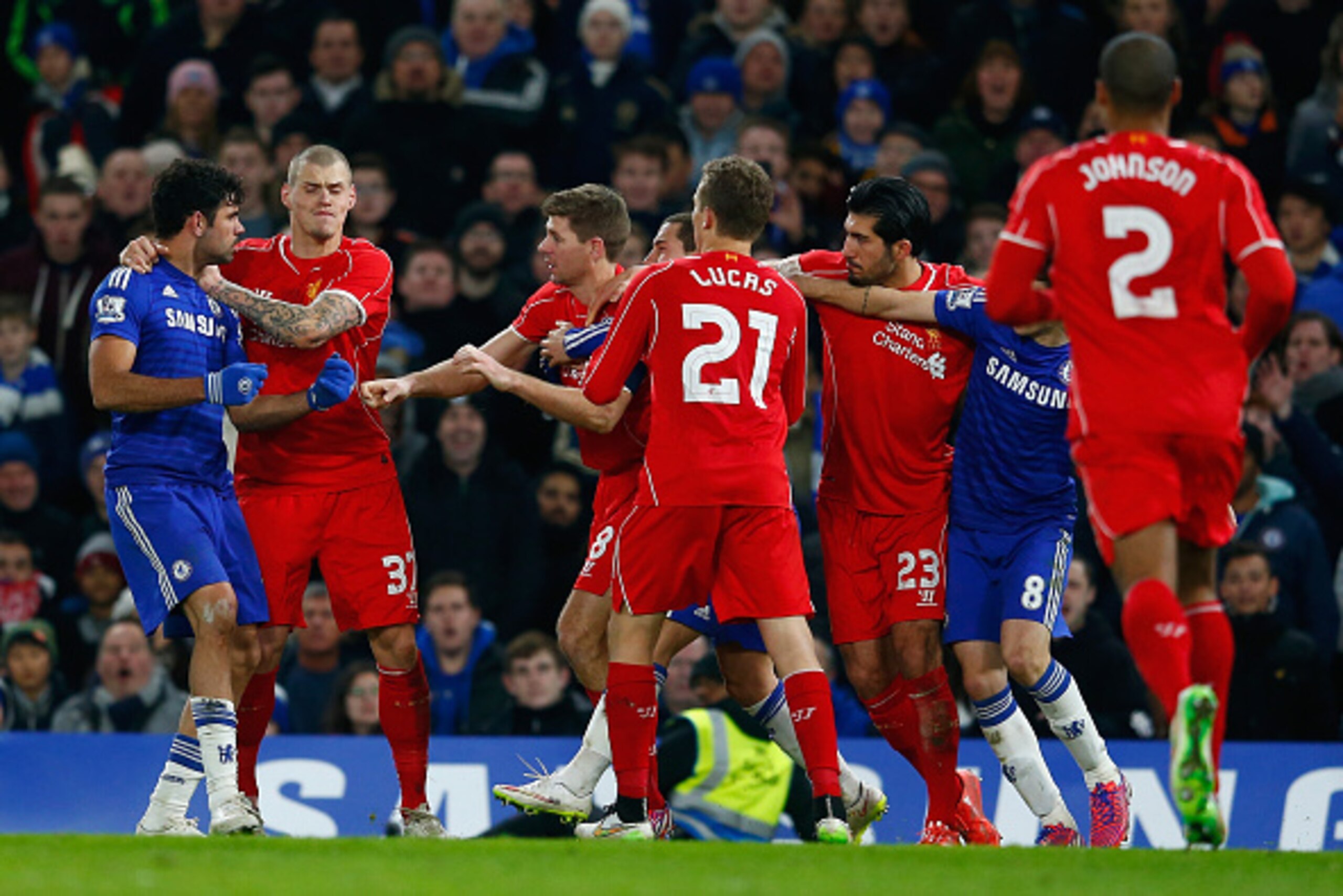 LONDON, ENGLAND - JANUARY 27:  Martin Skrtel of Liverpool (L) holds back Diego Costa of Chelsea as  he clashes with Steven Gerrard of Liverpool during the Capital One Cup Semi-Final second leg between Chelsea and Liverpool at Stamford Bridge on January 27