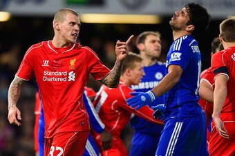 LONDON, ENGLAND - JANUARY 27:  Martin Skrtel of Liverpool clashes with Diego Costa of Chelsea during the Capital One Cup Semi-Final second leg between Chelsea and Liverpool at Stamford Bridge on January 27, 2015 in London, England.  (Photo by Mike Hewitt/