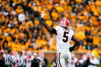 COLUMBIA, MO - OCTOBER 11:  Damian Swann #5 of the Georgia Bulldogs celebrates after intercepting a pass by Maty Mauk #7 of the Missouri Tigers late in the first quarter on October 11, 2014 at Faurot Field/Memorial Stadium in Columbia, Missouri. (Photo by