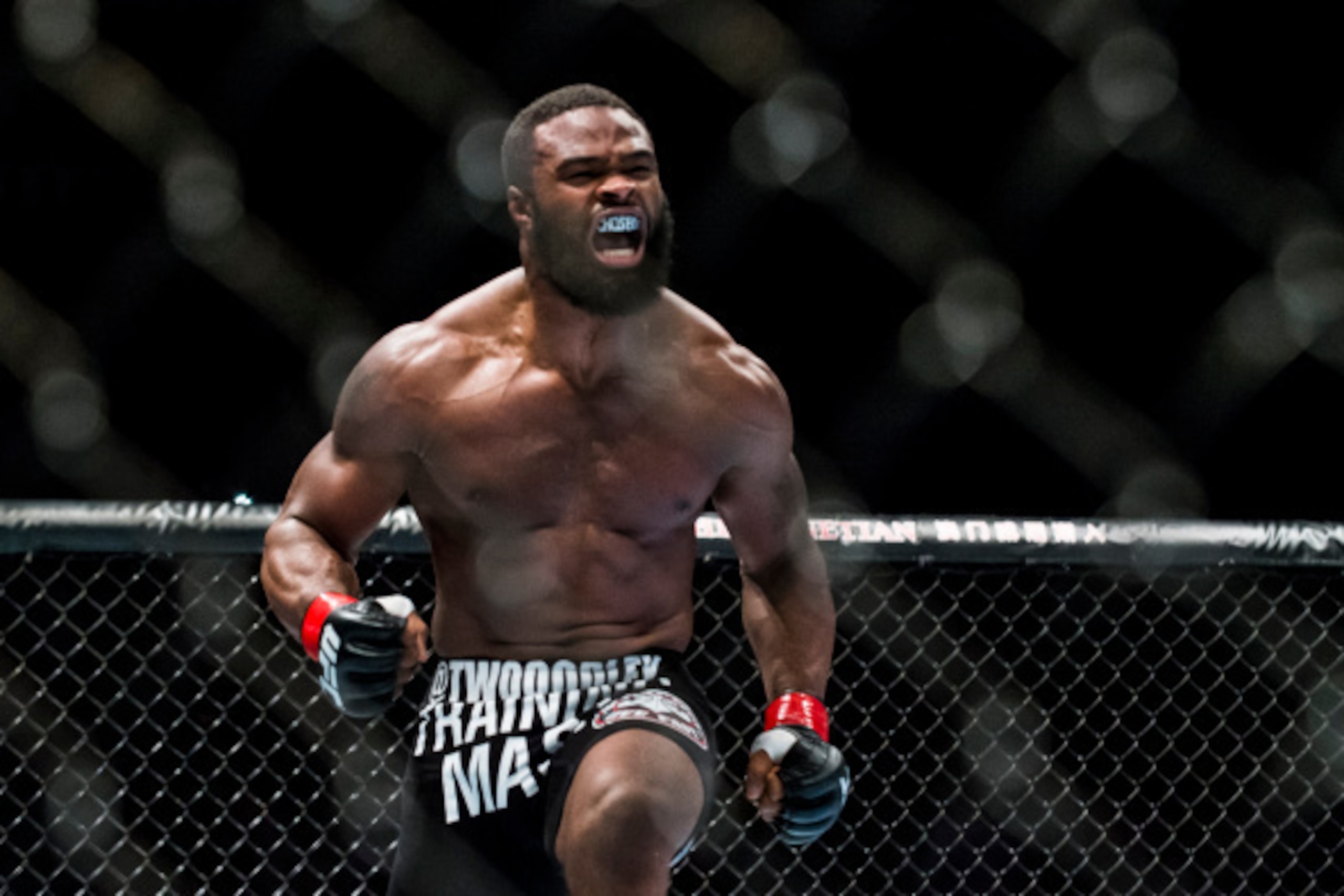 MACAU - AUGUST 23:  Tyron Woodley of USA celebrates after winning his welterweight fight against Dong Hyun Kim of South Korea during the UFC Fight Night at The Venetian Macao Cotai Arena on August 23, 2014 in Macau, China.  (Photo by Victor Fraile/Getty I