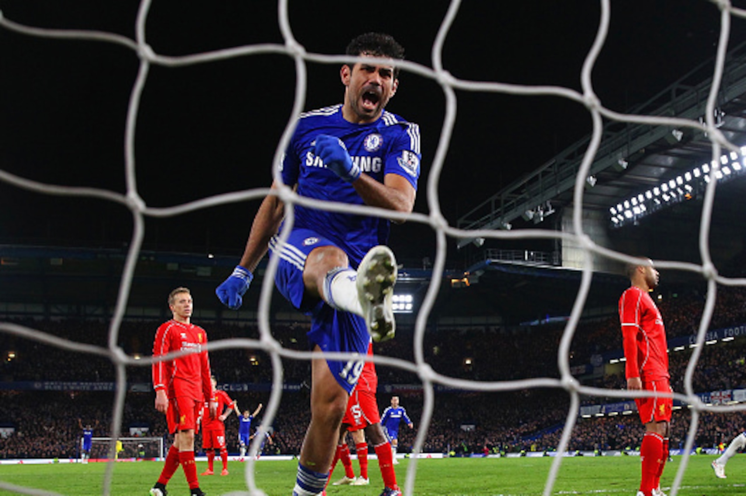 LONDON, ENGLAND - JANUARY 27:  Diego Costa of Chelse celebrates after Branislav Ivanovic of Chelsea scored the opening goal during the Capital One Cup Semi-Final second leg between Chelsea and Liverpool at Stamford Bridge on January 27, 2015 in London, En