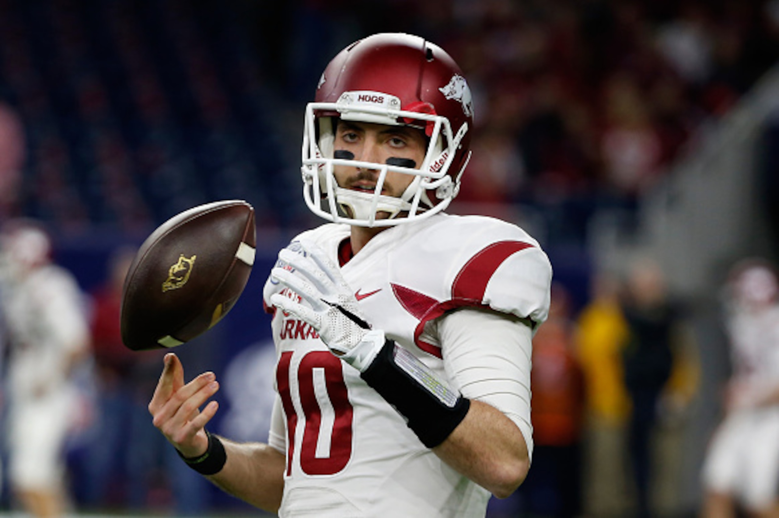 HOUSTON, TX - DECEMBER 29: Brandon Allen #10 of the Arkansas Razorbacks works with his team on the field before the start of their game against the Texas Longhorns at the AdvoCare V100 Texas Bowl at NRG Stadium on December 29, 2014 in Houston, Texas. (P HOUSTON, TX - DECEMBER 29: Brandon Allen #10 of the Arkansas Razorbacks works with his team on the field before the start of their game against the Texas Longhorns at the AdvoCare V100 Texas Bowl at NRG Stadium on December 29, 2014 in Houston, Texas. (P