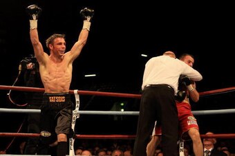 LONDON, ENGLAND - MAY 15:  Michael Katsidis of Australia celebrates beating Kevin Mitchell of England in the third round to retain the WBO Lightweight Championship of the World at Boleyn Ground on May 15, 2010 in London, England.  (Photo by Warren Little/