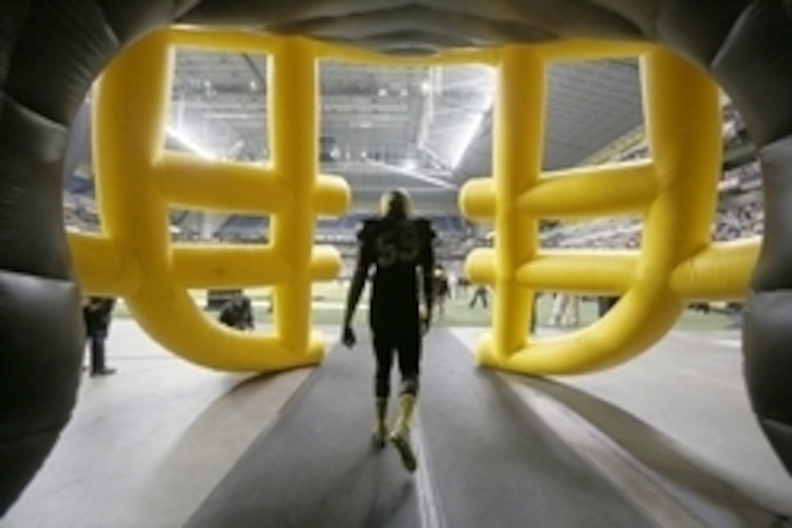 Jan 3, 2015; San Antonio, TX, USA; East offensive lineman Isaiah Prince (59) walks onto the field during the U.S. Army All-American Bowl at the Alamodome. West beat East 39-36. Mandatory Credit: Erich Schlegel-USA TODAY Sports