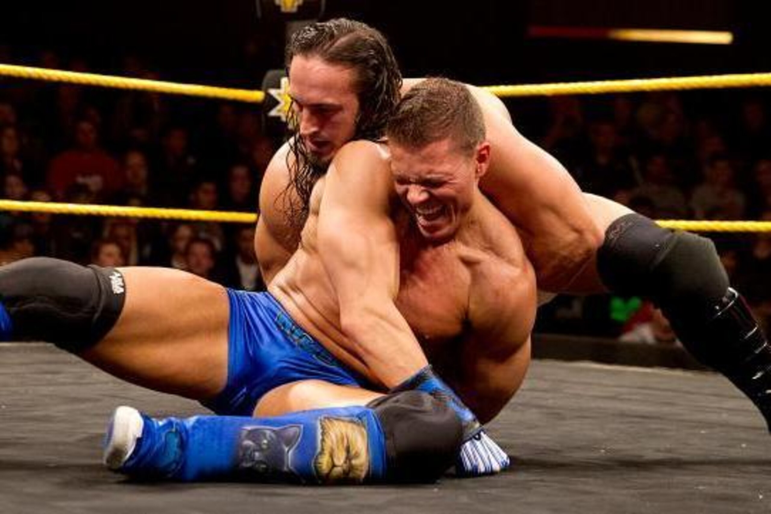 Adrian Neville in control of Tyson Kidd.