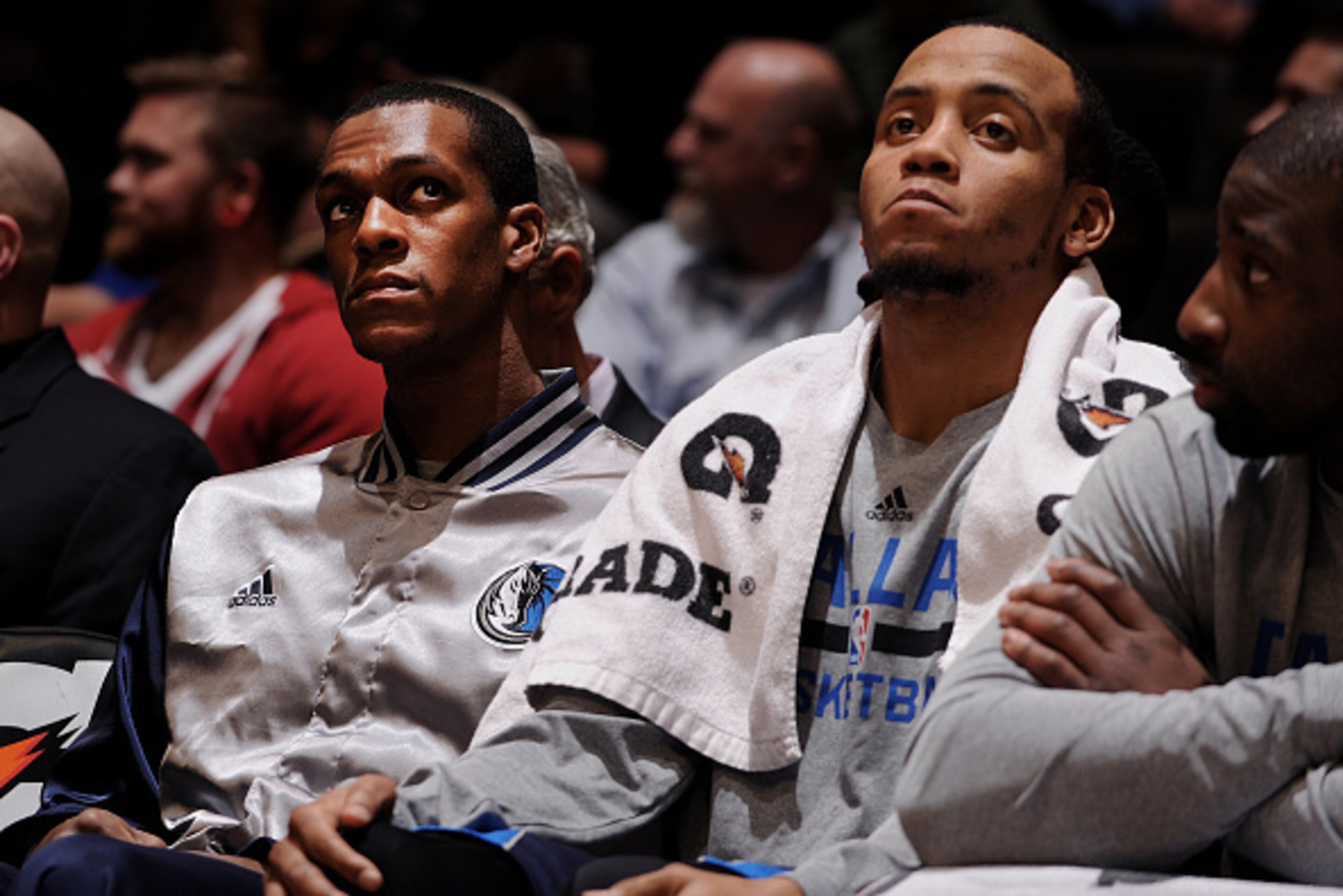 DENVER, CO - January 14: Rajon Rondo #9 and Monta Ellis #11 of the Dallas Mavericks sit on the sideline during a game against the Denver Nuggets on January 14, 2015 at the Pepsi Center in Denver, Colorado. NOTE TO USER: User expressly acknowledges and agr