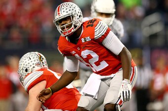 ARLINGTON, TX - JANUARY 12: Quarterback Cardale Jones #12 of the Ohio State Buckeyes looks on against the Oregon Ducks during the College Football Playoff National Championship Game at AT&T Stadium on January 12, 2015 in Arlington, Texas.  (Photo by Ronal