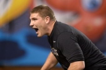 Dec 27, 2013; San Francisco, CA, USA; Washington Huskies coach Tosh Lupoi before the 2013 Fight Hunger Bowl against the BYU Cougars at AT&T Park. Mandatory Credit: Kirby Lee-USA TODAY Sports