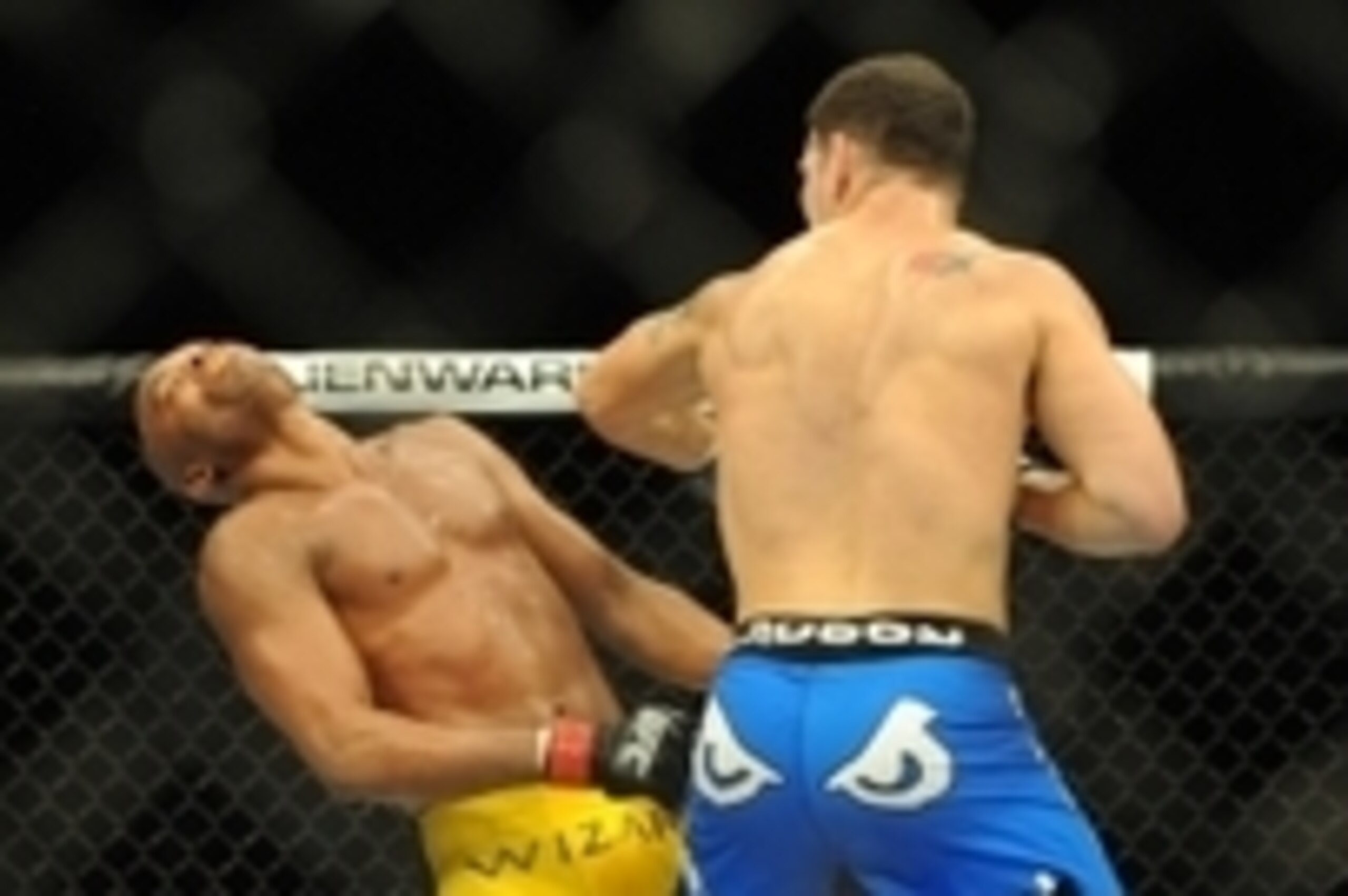 Jul 6, 2013; Las Vegas, NV, USA;  Chris Weidman, blue shorts, defeated Anderson Silva (yellow shorts) in their Middleweight Chamionship Bout in the second round with a TKO at the MGM Grand Garden Arena. Mandatory Credit: Jayne Kamin-Oncea-USA TODAY Sports
