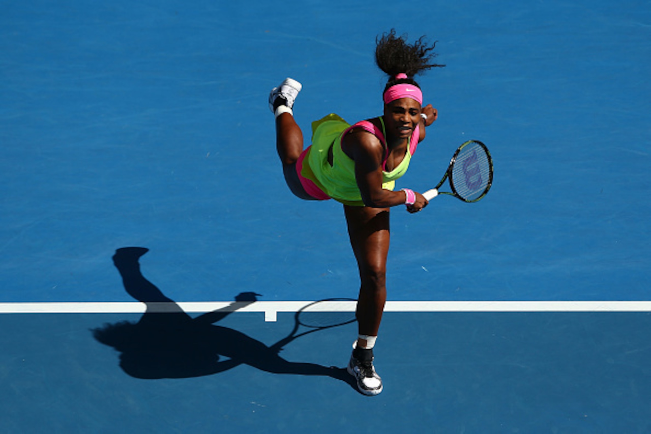 MELBOURNE, AUSTRALIA - JANUARY 29:  Serena Williams of the United States serves in her semifinal match against Madison Keys of the United States during day 11 of the 2015 Australian Open at Melbourne Park on January 29, 2015 in Melbourne, Australia.  (Pho