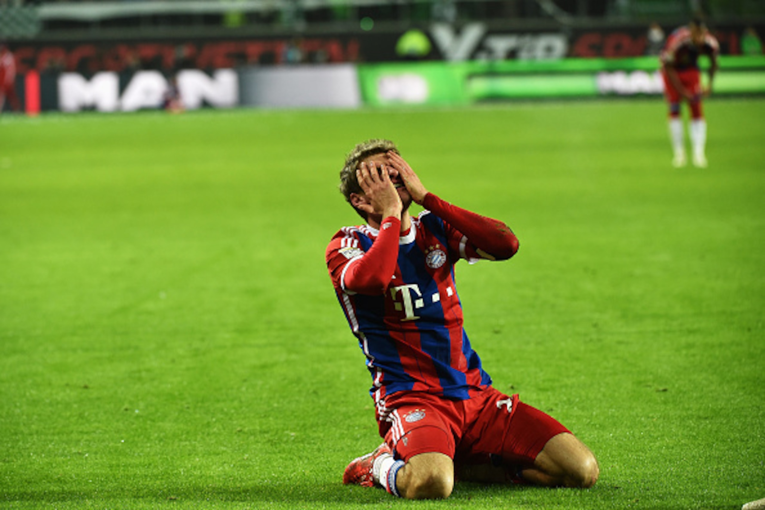 WOLFSBURG, GERMANY - JANUARY 30:  Thomas Mueller of Muenchen reacts during the Bundesliga match between VfL Wolfsburg and FC Bayern Muenchen at Volkswagen Arena on January 30, 2015 in Wolfsburg, Germany.  (Photo by Stuart Franklin/Getty Images for MAN)