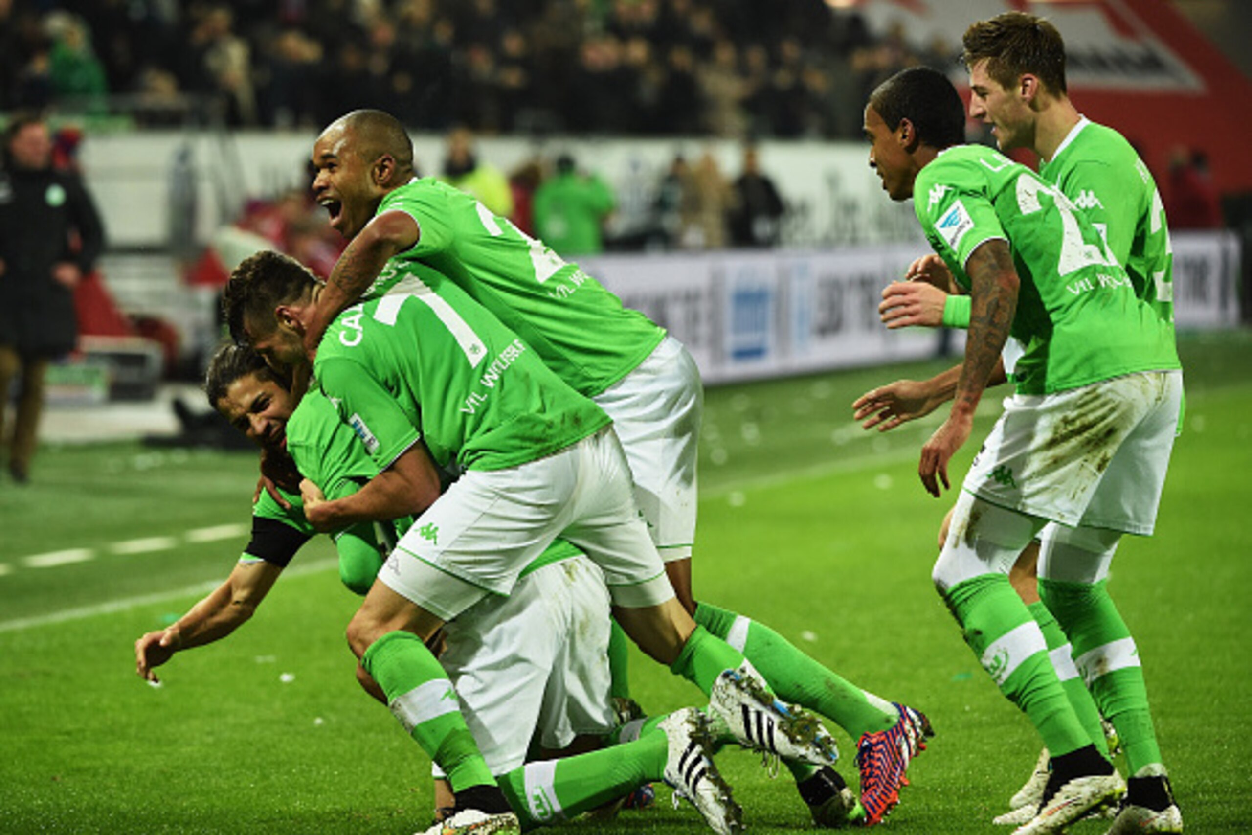 WOLFSBURG, GERMANY - JANUARY 30:  Bas Dost of Wolfsburg celebrate scoring his second goal during the Bundesliga match between VfL Wolfsburg and FC Bayern Muenchen at Volkswagen Arena on January 30, 2015 in Wolfsburg, Germany.  (Photo by Stuart Franklin/Ge