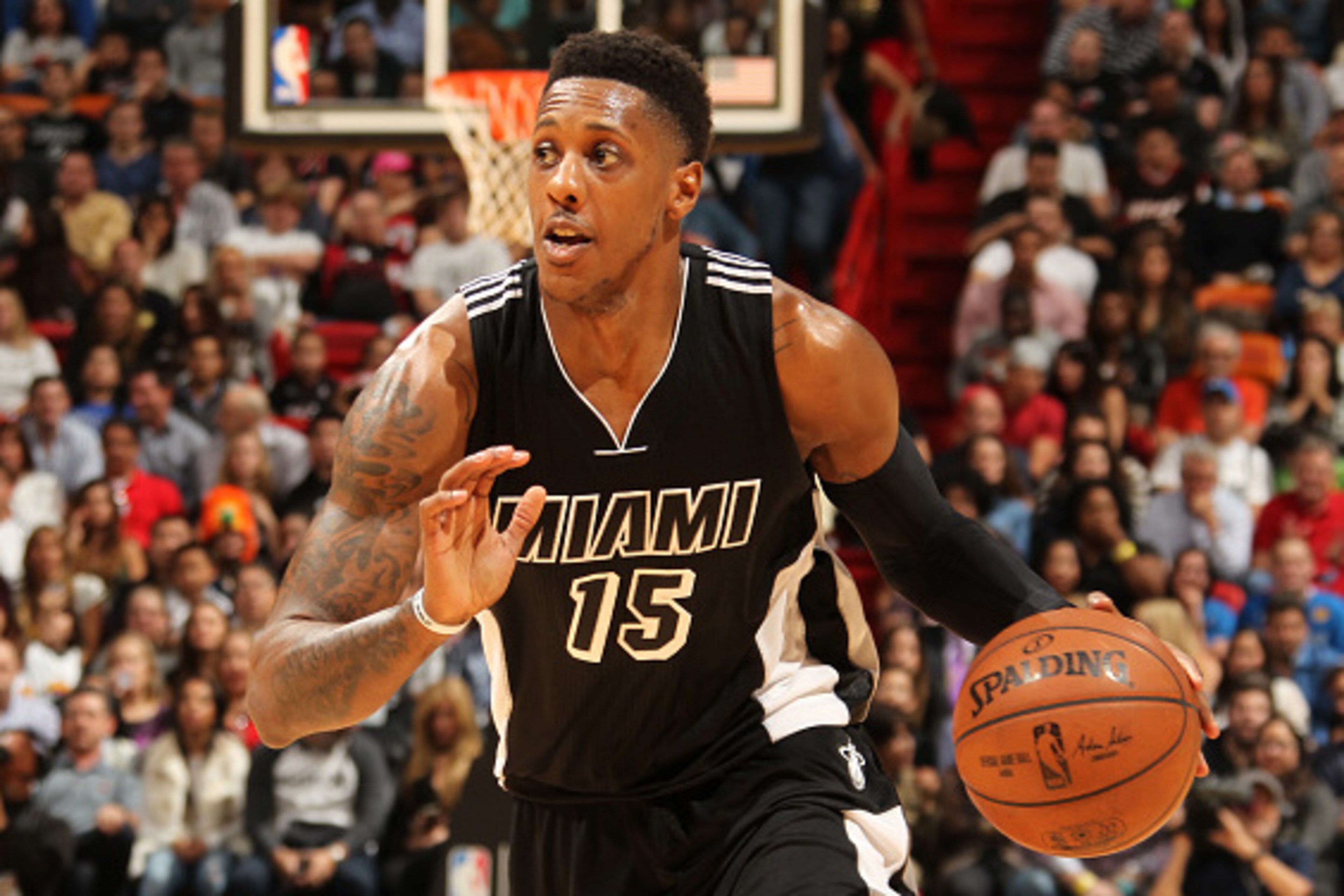 MIAMI, FL - JANUARY 30:  Mario Chalmers #15 of the Miami Heat handles the ball against the Dallas Mavericks on January 30, 2015 at American Airlines Arena in Miami, Florida. NOTE TO USER: User expressly acknowledges and agrees that, by downloading and or 