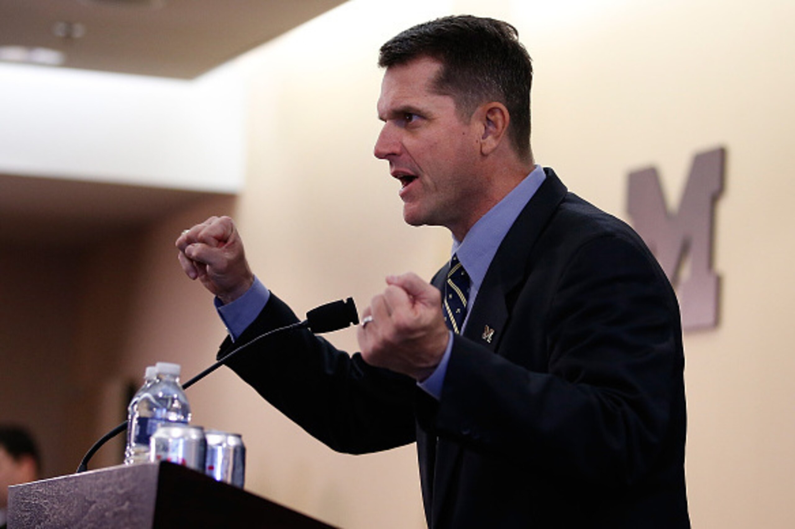 ANN ARBOR, MI - DECEMBER 30:  Jim Harbaugh speaks as he is introduced as the new Head Coach of the University of Michigan football team at the Junge Family Champions Center on December 30, 2014 in Ann Arbor, Michigan.  (Photo by Gregory Shamus/Getty Image
