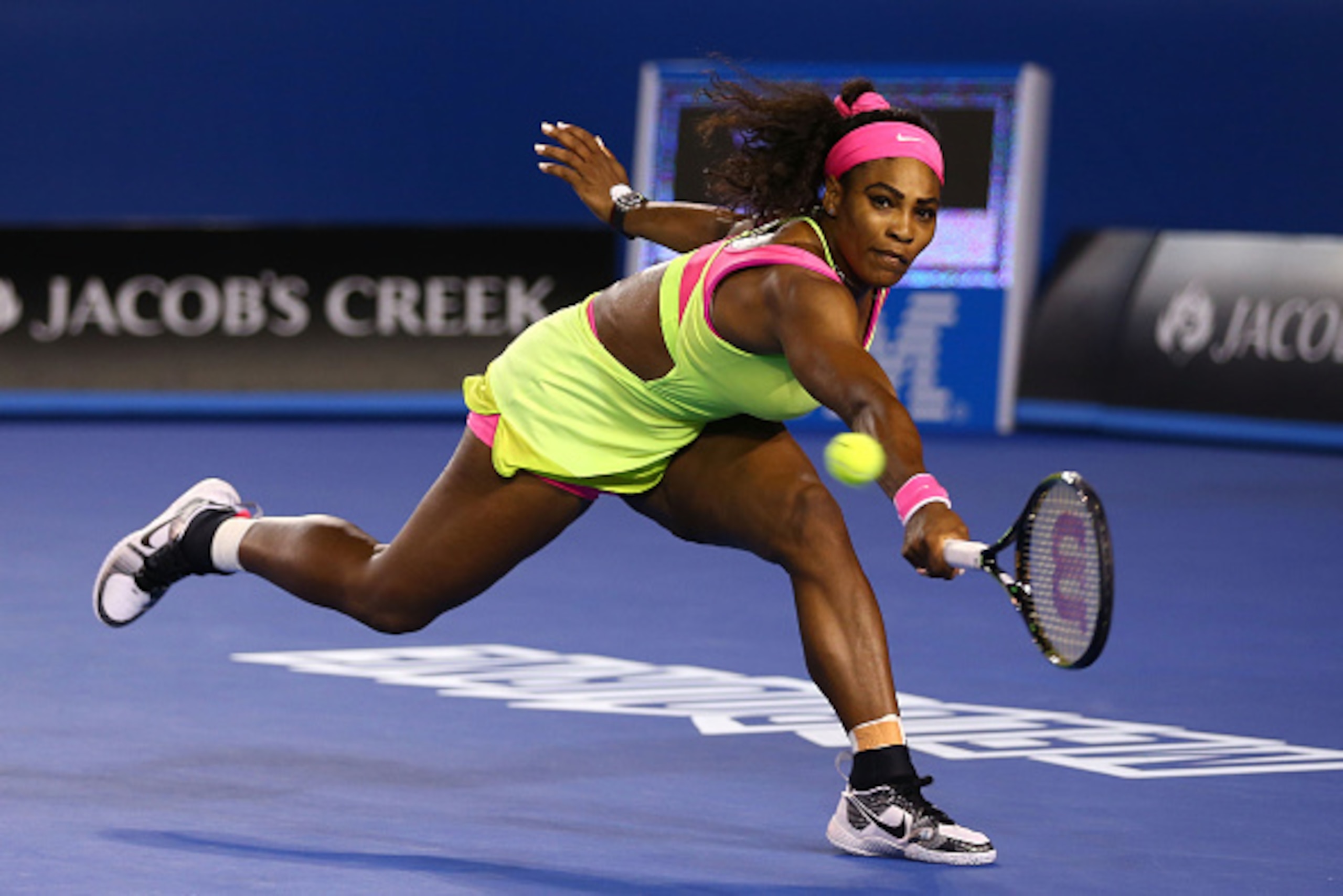 MELBOURNE, AUSTRALIA - JANUARY 31:  Serena Williams of the United States plays a backhand in her women's final match against Maria Sharapova of Russia during day 13 of the 2015 Australian Open at Melbourne Park on January 31, 2015 in Melbourne, Australia.