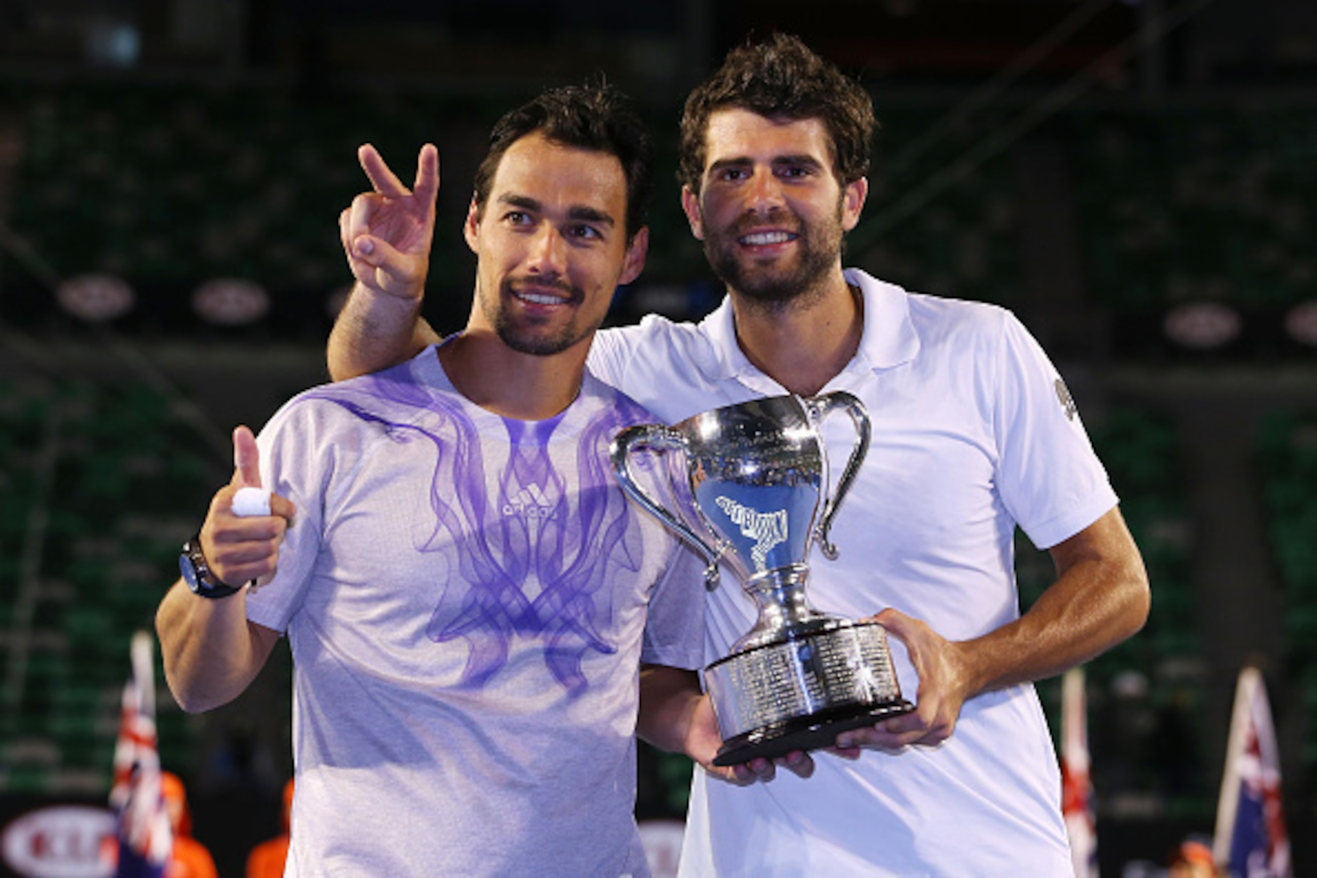 MELBOURNE, AUSTRALIA - JANUARY 31:  Simone Bolelli of Italy and Fabio Fognini of Italy celebrate with the winners trophy aftwe winning their final doubles match against Pierre-Hugues Herbert of France and Nicolas Mahut of France during day 13 of the 2015 