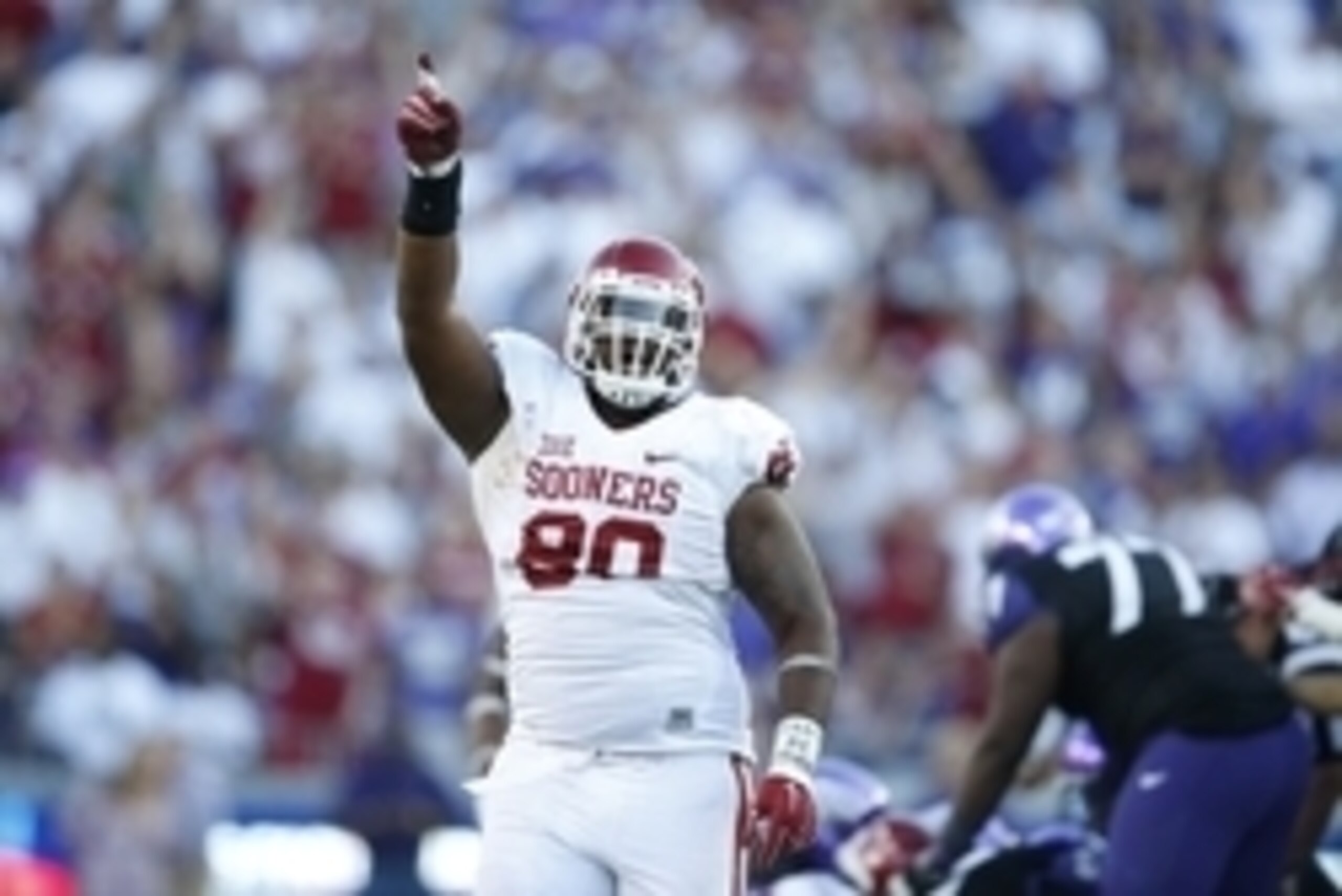 Oct 4, 2014; Fort Worth, TX, USA; Oklahoma Sooners defensive tackle Jordan Phillips (80) celebrates a turnover against the TCU Horned Frogs at Amon G. Carter Stadium. Mandatory Credit: Matthew Emmons-USA TODAY Sports