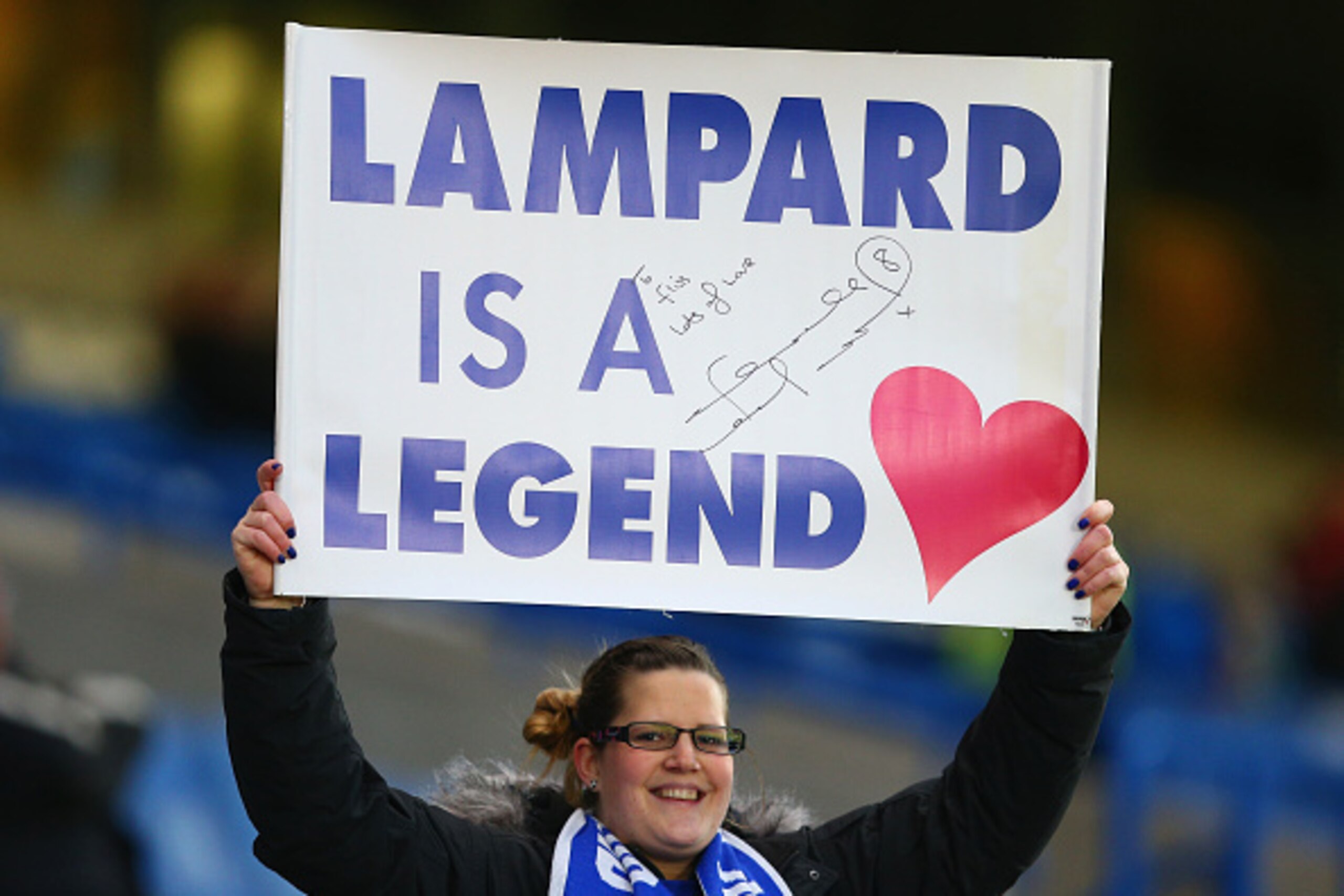 LONDON, ENGLAND - JANUARY 31: Chelsea fans hold up signs to former Chelsea player Frank Lampard of Manchester City during the Barclays Premier League match between Chelsea and Manchester City at Stamford Bridge on January 31, 2015 in London, England. (P LONDON, ENGLAND - JANUARY 31: Chelsea fans hold up signs to former Chelsea player Frank Lampard of Manchester City during the Barclays Premier League match between Chelsea and Manchester City at Stamford Bridge on January 31, 2015 in London, England. (P