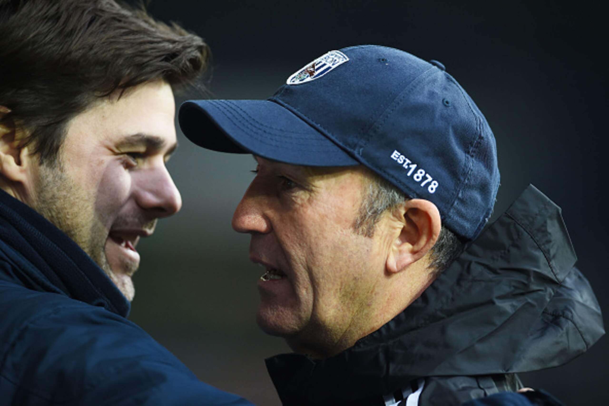 WEST BROMWICH, ENGLAND - JANUARY 31:  (L-R) Mauricio Pochettino of Spurs and Tony Pulis the manager of West Brom greet each other prior to kickoff during the Barclays Premier League match between West Bromwich Albion and Tottenham Hotspur at The Hawthorns