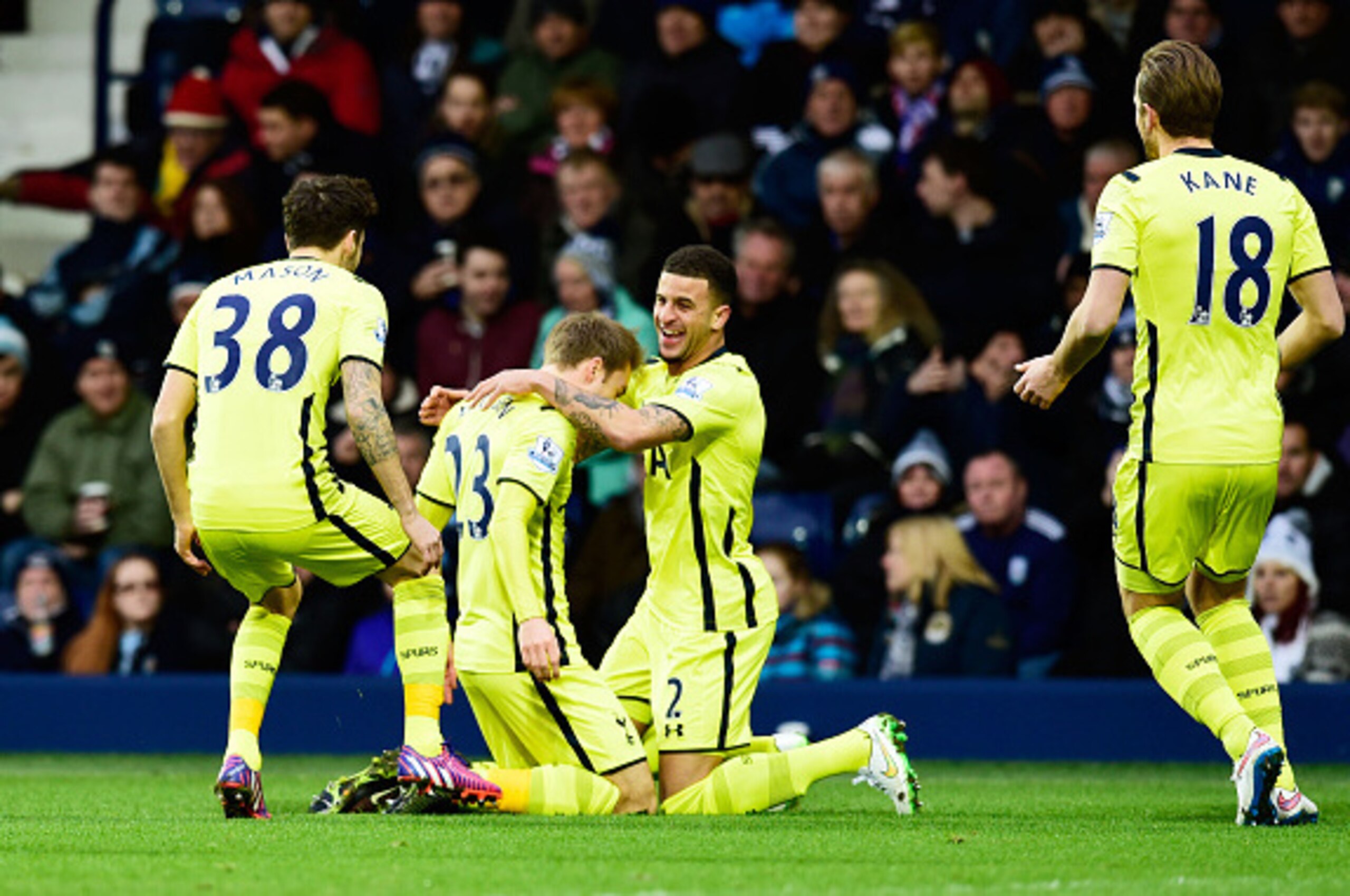 WEST BROMWICH, ENGLAND - JANUARY 31:  Christian Eriksen (2nd L)of Spurs is congratulated by teammates after scoring the opening goal during the Barclays Premier League match between West Bromwich Albion and Tottenham Hotspur at The Hawthorns on January 31
