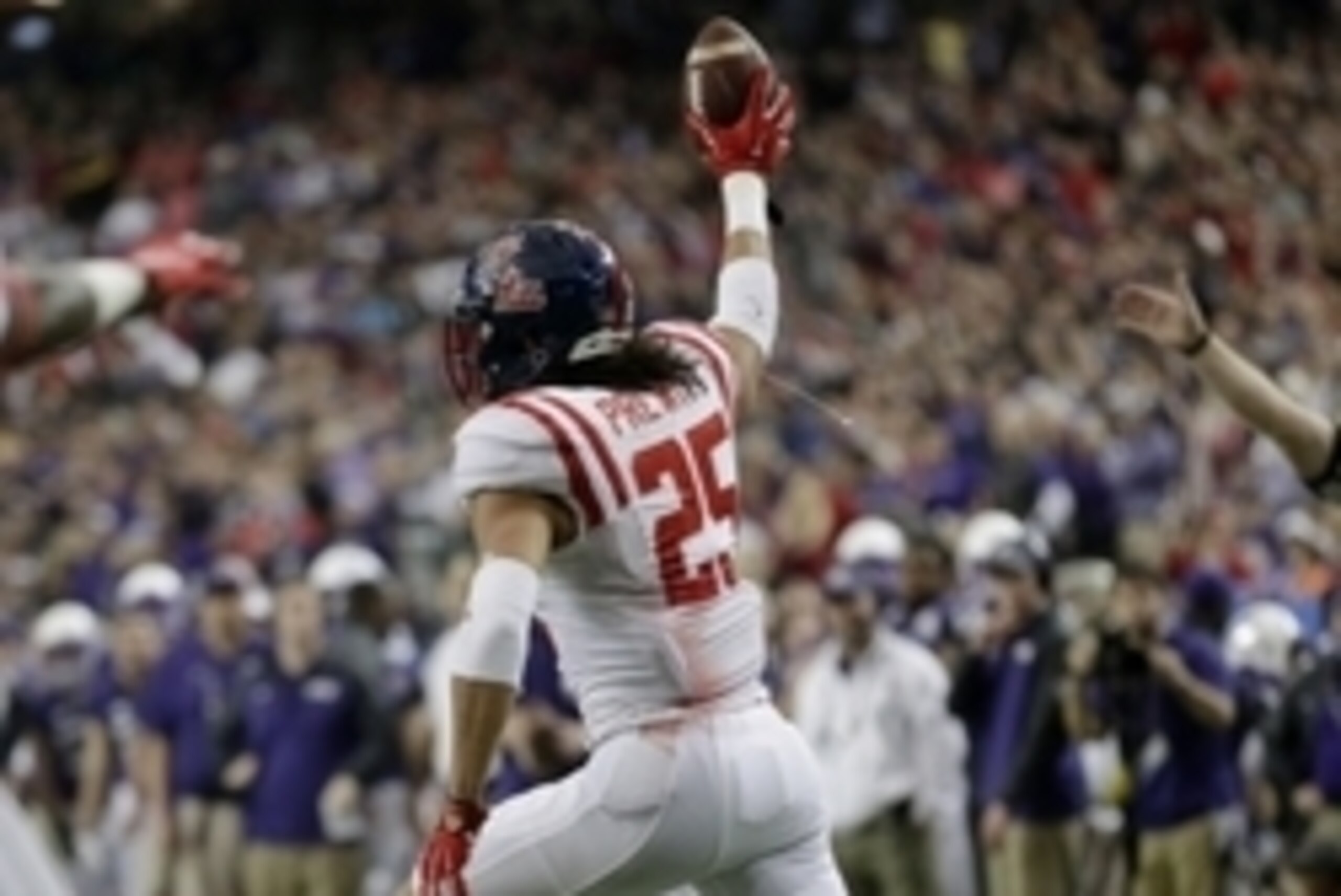 Dec 31, 2014; Atlanta , GA, USA; Mississippi Rebels defensive back Cody Prewitt (25) celebrates an interception during the second quarter in the 2014 Peach Bowl against the TCU Horned Frogs at the Georgia Dome. Mandatory Credit: Paul Abell/CFA Peach Bowl 
