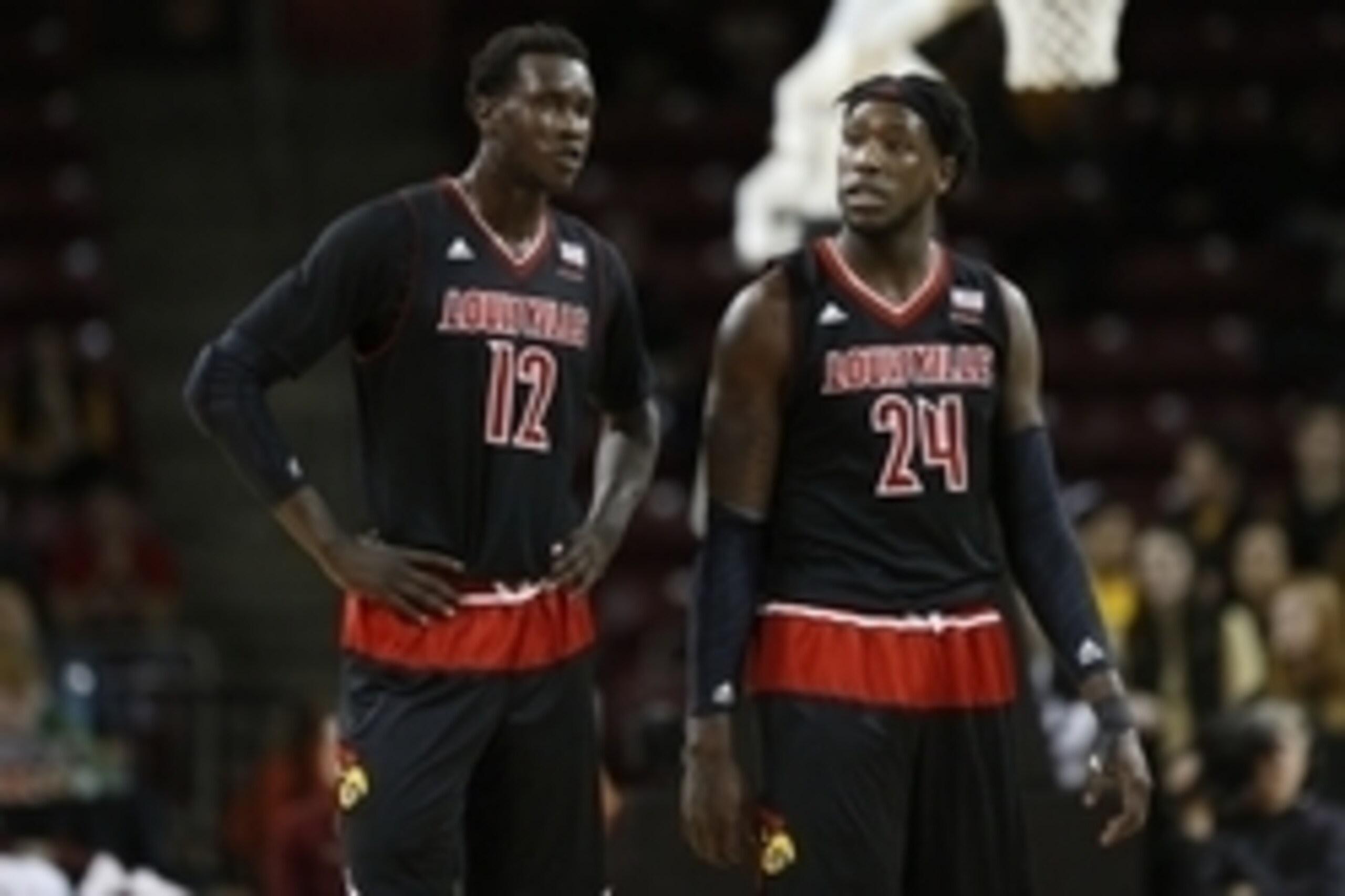 Jan 28, 2015; Chestnut Hill, MA, USA; Louisville Cardinals forward Montrezl Harrell (24) and forward center Mangok Mathiang (12) during the second half against the Boston College Eagles at Silvio O. Conte Forum. Louisville Cardinals won 81-72.  Mandatory 