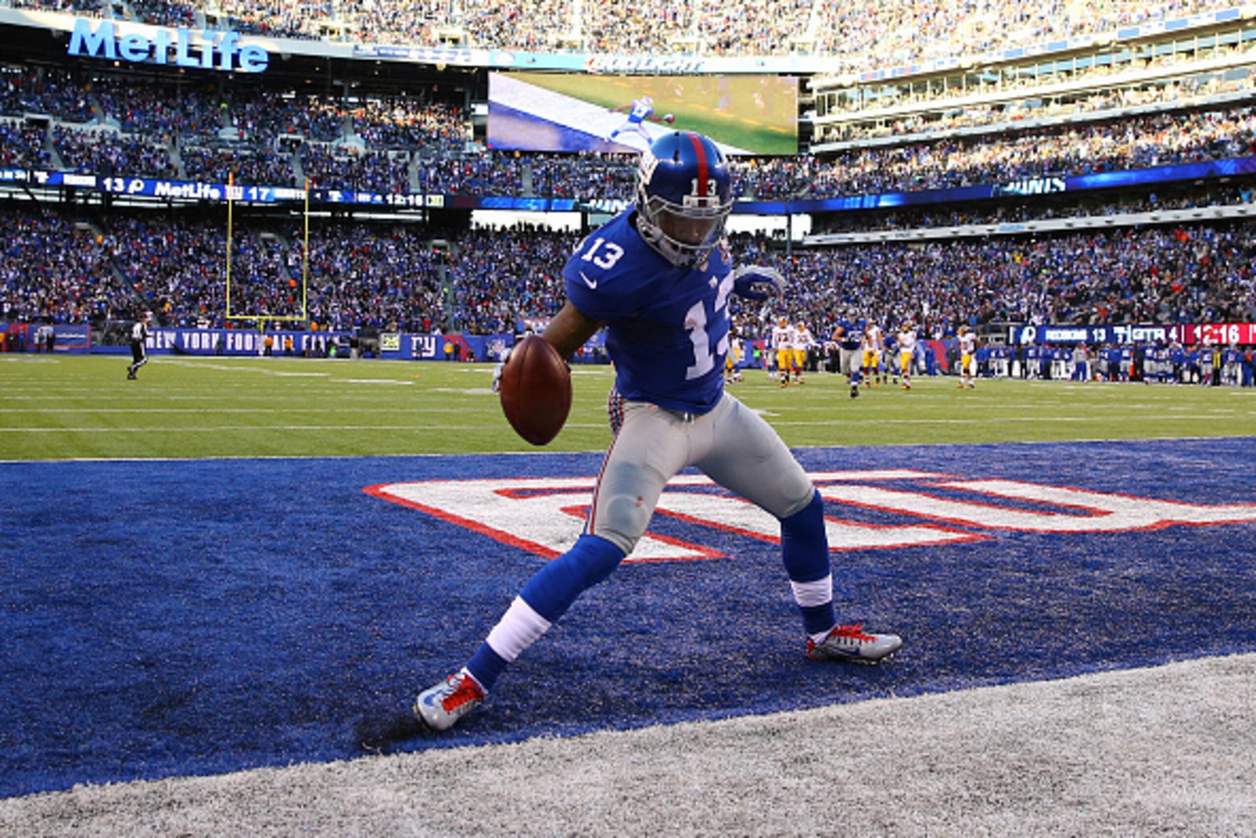 EAST RUTHERFORD, NJ - DECEMBER 14:  Odell Beckham Jr. #13 of the New York Giants celebrates after an attempted 30 yard touchdown that was nullified due to a penalty in the fourth quarter during their game against the Washington Redskins at MetLife Stadium