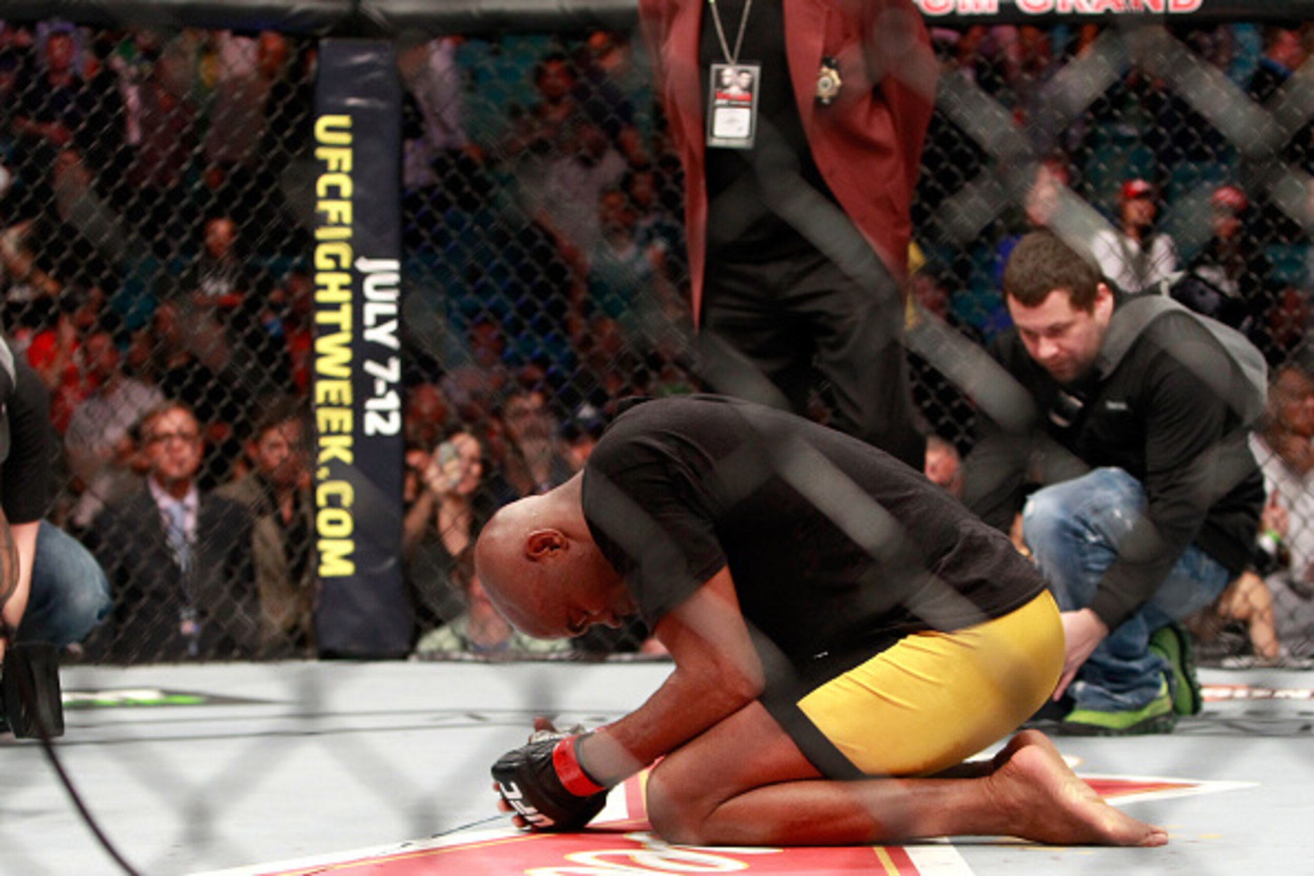 LAS VEGAS, NV - JANUARY 31:  Anderson Silva kneels on the mat after beating Nick Diaz in a middleweight bout during UFC 183 at the MGM Grand Garden Arena on January 31, 2015 in Las Vegas, Nevada. Silva won by unanimous decision.  (Photo by Steve Marcus/Ge