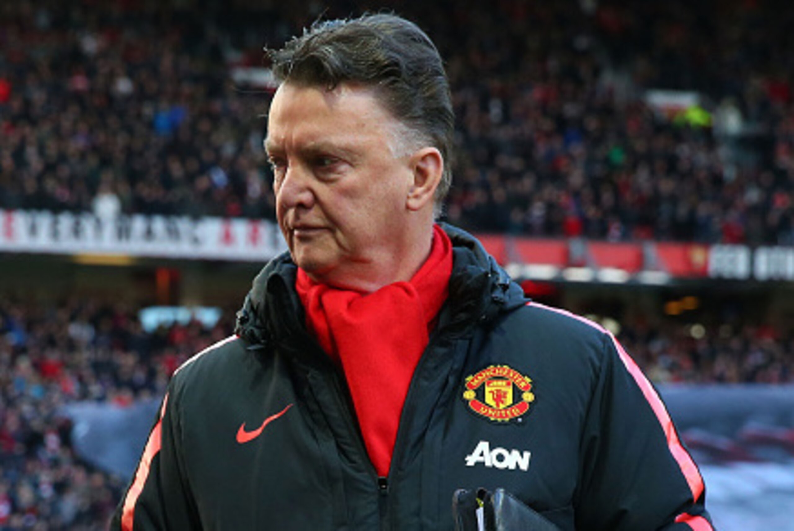 MANCHESTER, ENGLAND - JANUARY 31:  Manager Louis van Gaal of Manchester United takes his seat prior to kickoff during the Barclays Premier League match between Manchester United and Leicester City at Old Trafford on January 31, 2015 in Manchester, England