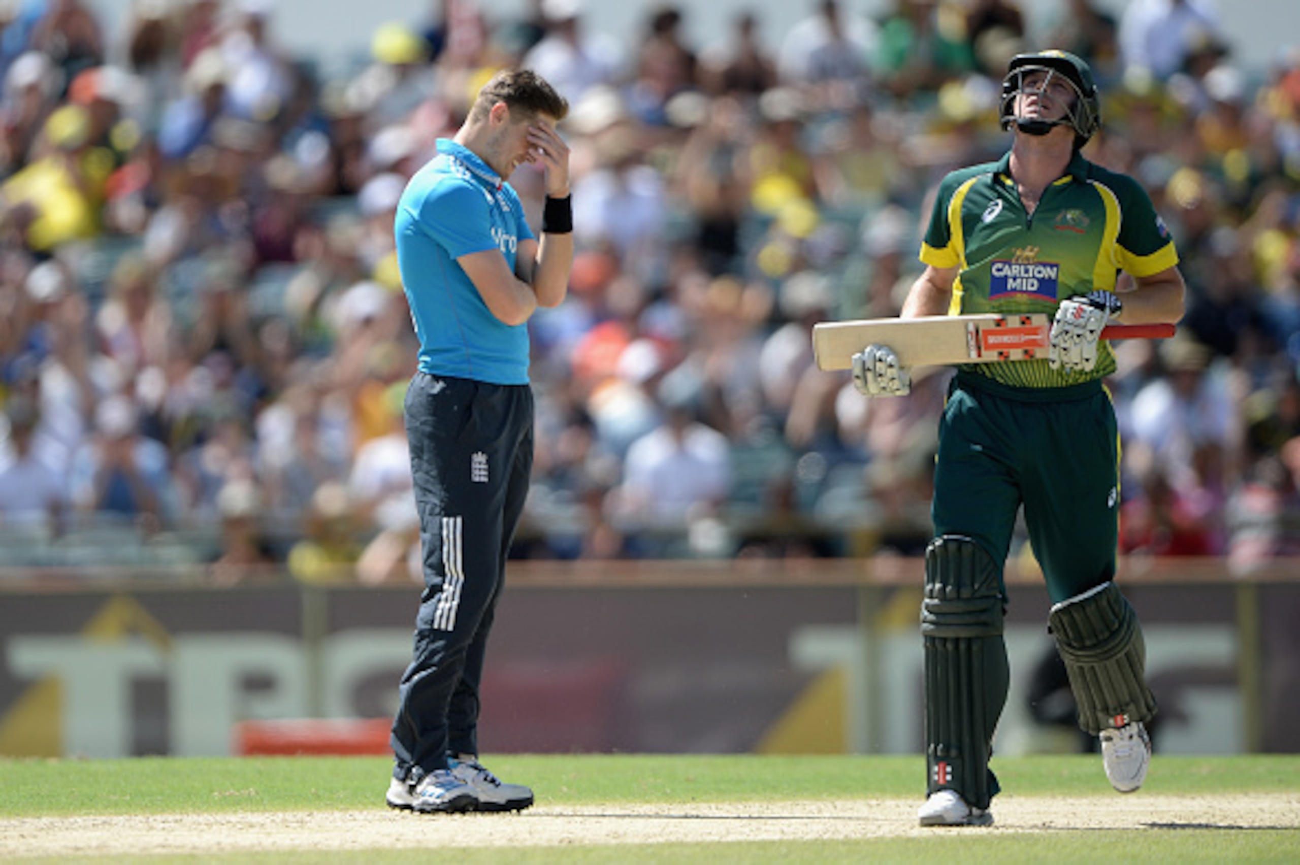 PERTH, AUSTRALIA - FEBRUARY 01:  Chris Woakes of England holds his head after bowling to James Faulkner of Australia during the final match of the Carlton Mid One Day International series between Australia and England at WACA on February 1, 2015 in Perth,