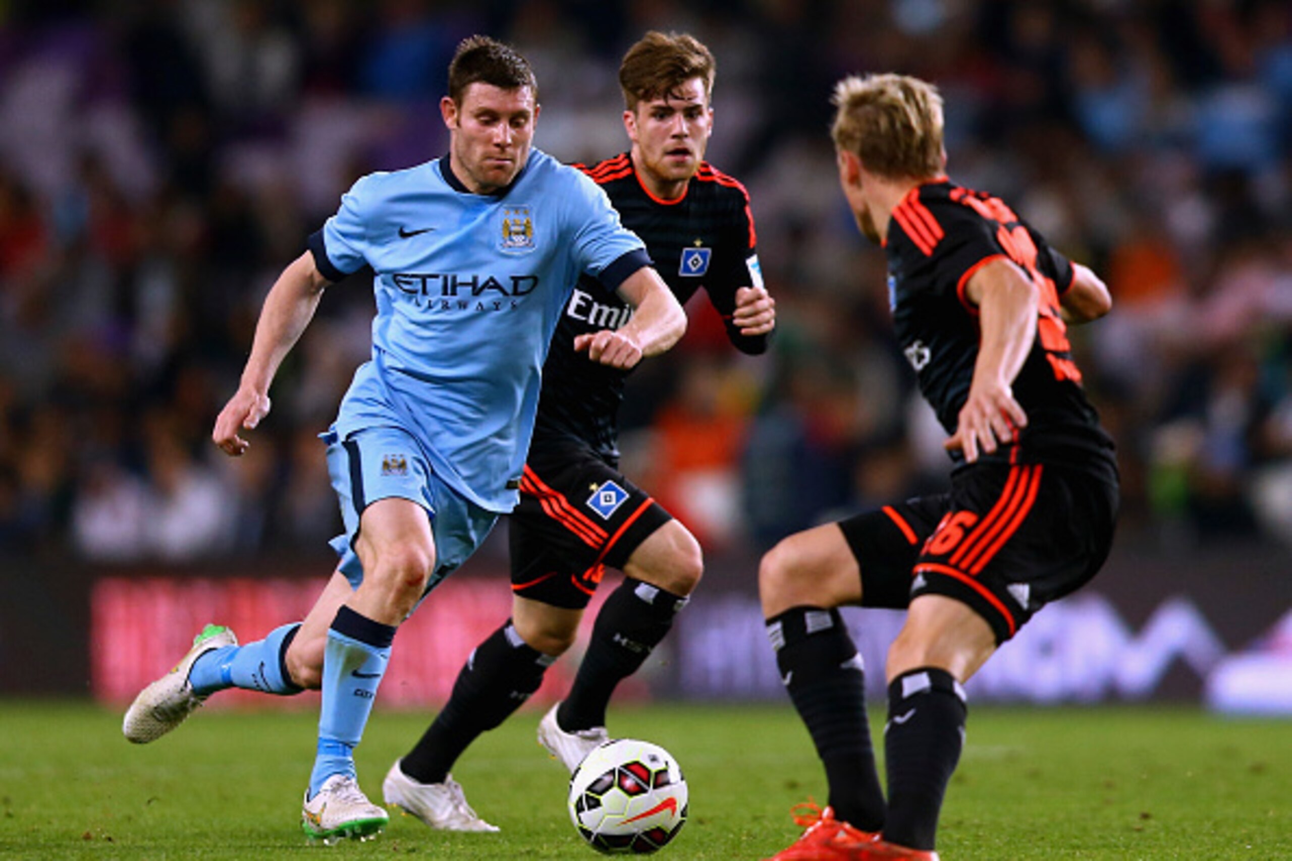 AL AIN, UNITED ARAB EMIRATES - JANUARY 21:  James Milner of Manchester City in action during the friendly match between Hamburg SV and Manchester City at Hazza bin Zayed Stadium on January 21, 2015 in Al Ain, United Arab Emirates.  (Photo by Francois Nel/