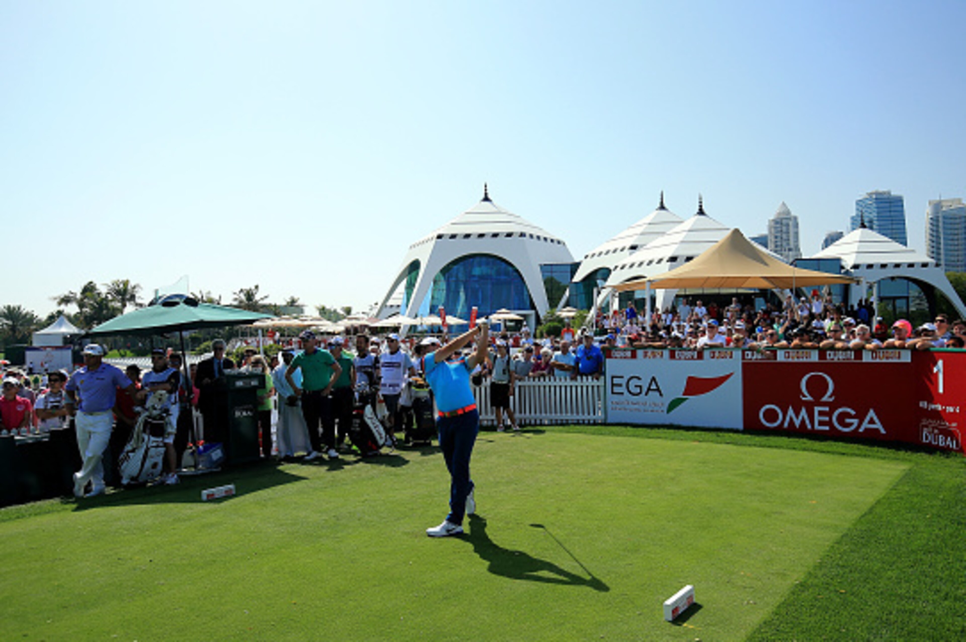 DUBAI, UNITED ARAB EMIRATES - FEBRUARY 01:  Rory McIlroy of Northern Ireland plays his tee shot on the par 4, first hole during the final round of the 2015 Omega Dubai Desert Classic on the Majlis Course at the Emirates Golf Club on February 1, 2015 in Du