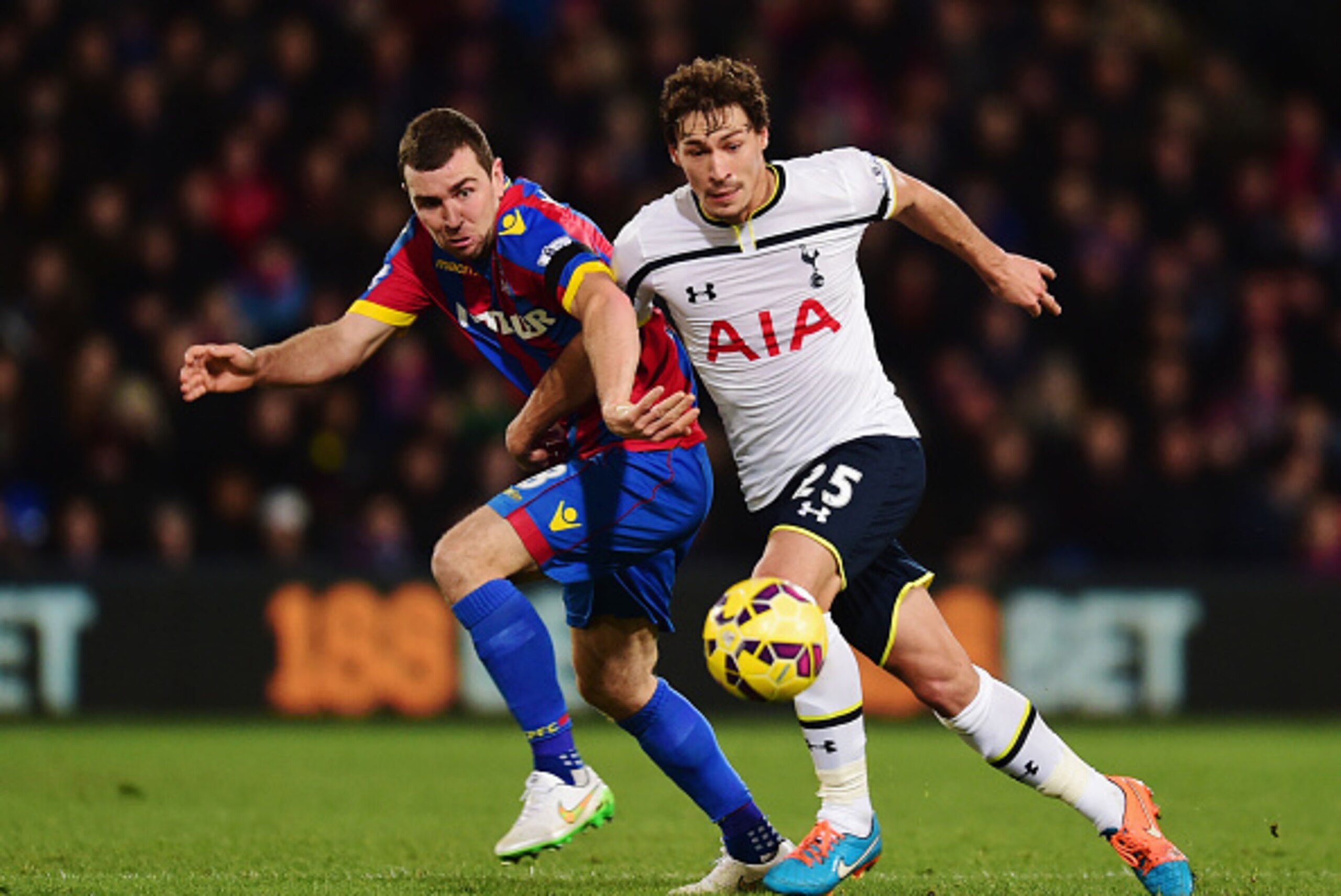 LONDON, ENGLAND - JANUARY 10:  James McArthur of Crystal Palace battles with Benjamin Stambouli of Spurs during the Barclays Premier League match between Crystal Palace and Tottenham Hotspur at Selhurst Park on January 10, 2015 in London, England.  (Photo