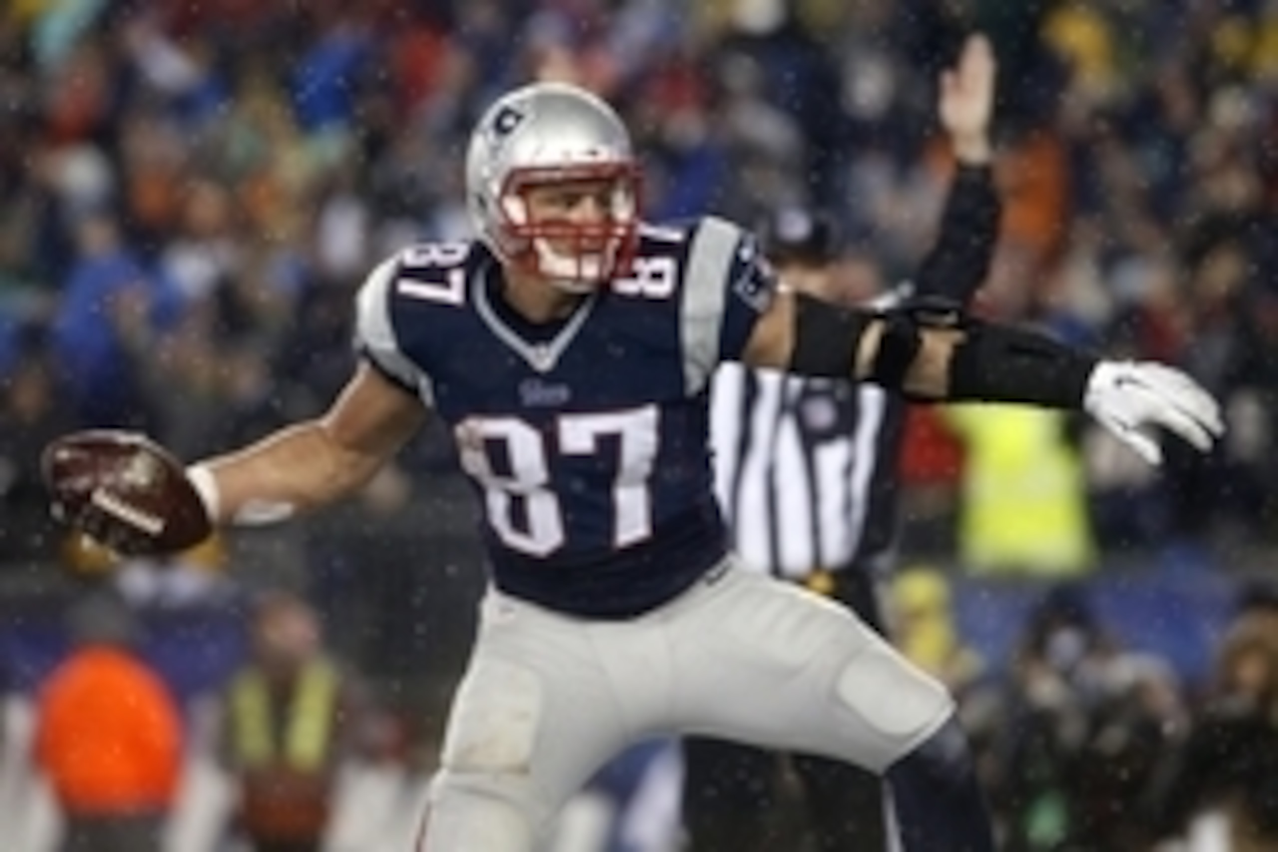 Jan 18, 2015; Foxborough, MA, USA; New England Patriots tight end Rob Gronkowski (87) celebrates after scoring a touchdown against the Indianapolis Colts in the third quarter in the AFC Championship Game at Gillette Stadium. Mandatory Credit: David Butler
