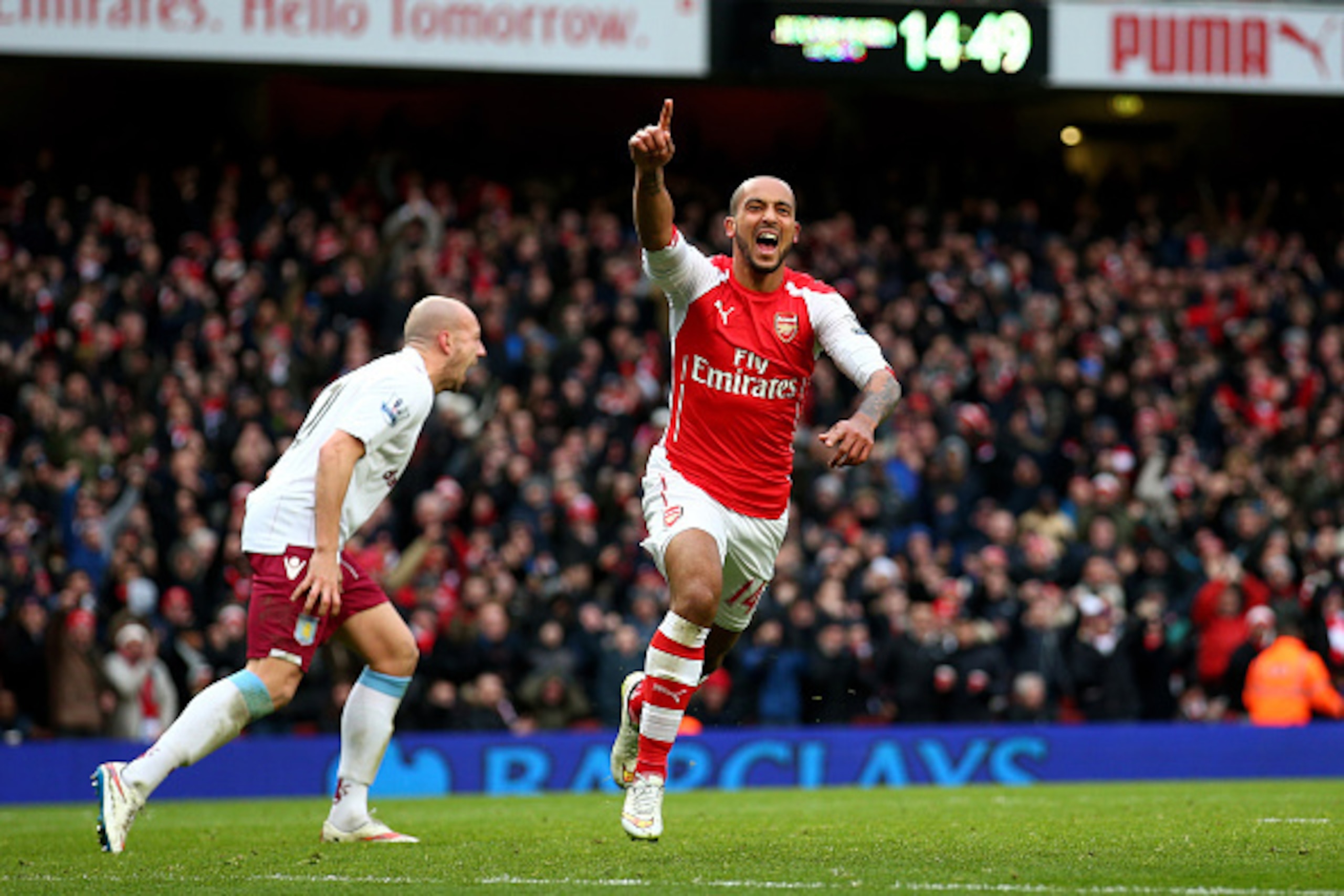 LONDON, ENGLAND - FEBRUARY 01: Theo Walcott of Arsena celebrates after scoring his team's third goal during the Barclays Premier League match between Arsenal and Aston Villa at the Emirates Stadium on February 1, 2015 in London, England. (Photo by Paul LONDON, ENGLAND - FEBRUARY 01: Theo Walcott of Arsena celebrates after scoring his team's third goal during the Barclays Premier League match between Arsenal and Aston Villa at the Emirates Stadium on February 1, 2015 in London, England. (Photo by Paul