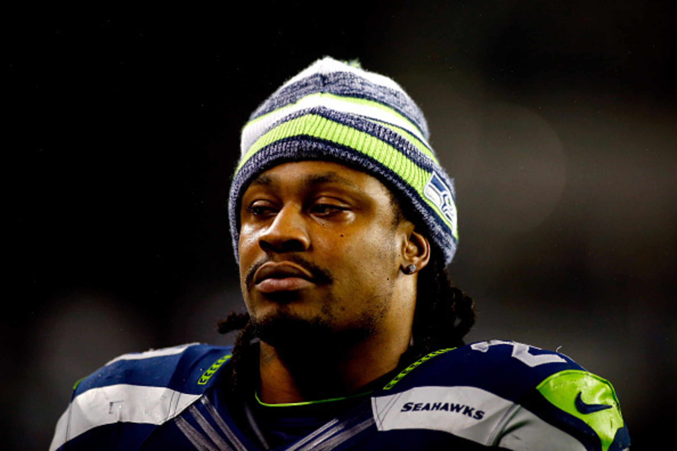 SEATTLE, WA - JANUARY 10:  Marshawn Lynch #24 of the Seattle Seahawks looks on against the Carolina Panthers during the 2015 NFC Divisional Playoff game at CenturyLink Field on January 10, 2015 in Seattle, Washington.  (Photo by Jonathan Ferrey/Getty Imag