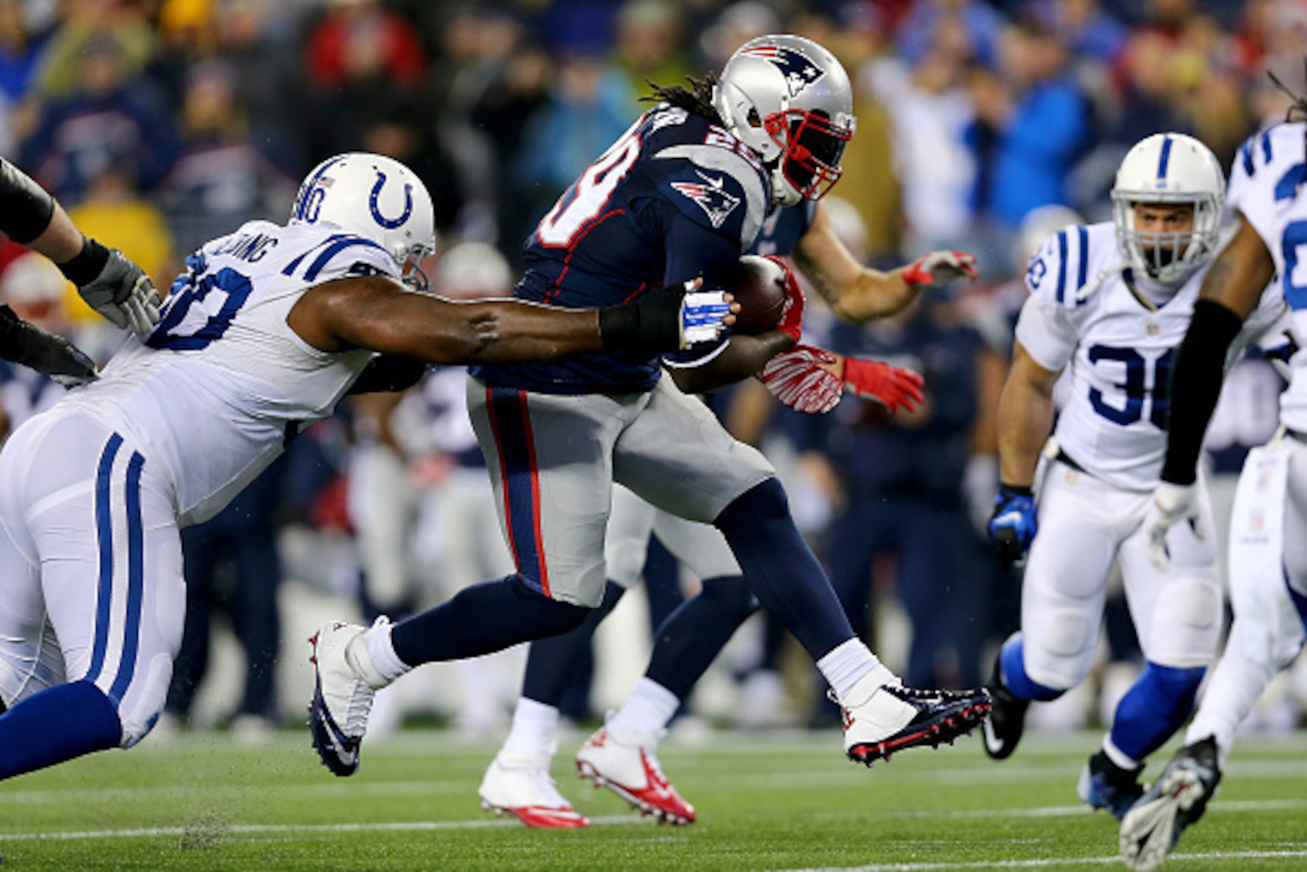 FOXBORO, MA - JANUARY 18:  LeGarrette Blount #29 of the New England Patriots runs with the ball in the first quarter against the Indianapolis Colts of the 2015 AFC Championship Game at Gillette Stadium on January 18, 2015 in Foxboro, Massachusetts.  (Phot