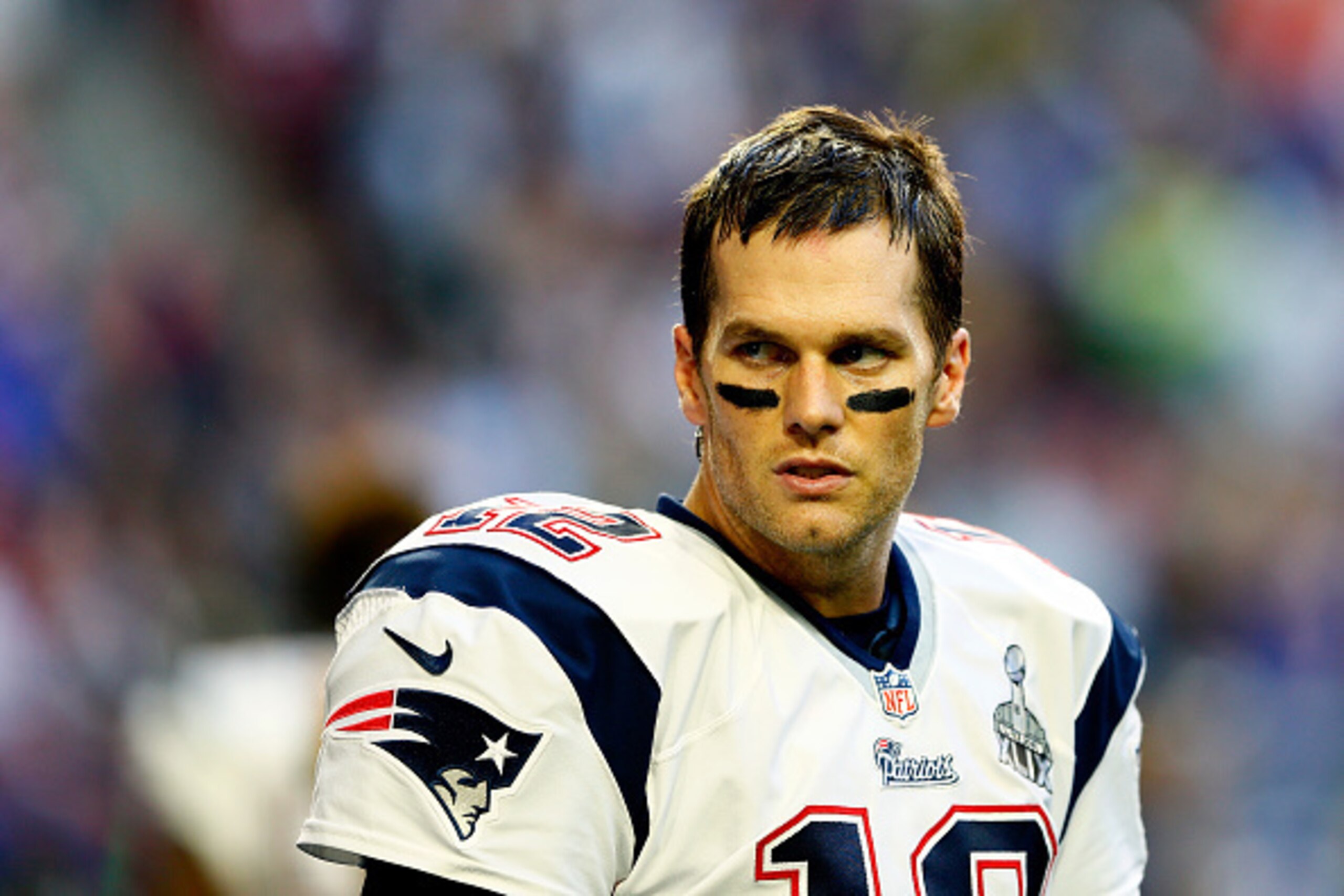 GLENDALE, AZ - FEBRUARY 01:  Tom Brady #12 of the New England Patriots looks on prior to Super Bowl XLIX against the Seattle Seahawks at University of Phoenix Stadium on February 1, 2015 in Glendale, Arizona.  (Photo by Kevin C. Cox/Getty Images)