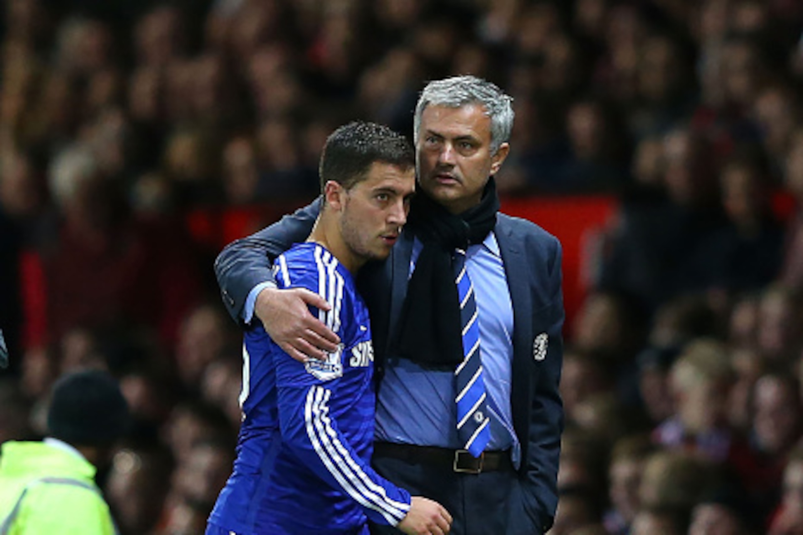 MANCHESTER, ENGLAND - OCTOBER 26:  Chelsea Manager Jose Mourinho embraces Eden Hazard during the Barclays Premier League match between Manchester United and Chelsea at Old Trafford on October 26, 2014 in Manchester, England.  (Photo by Alex Livesey/Getty 