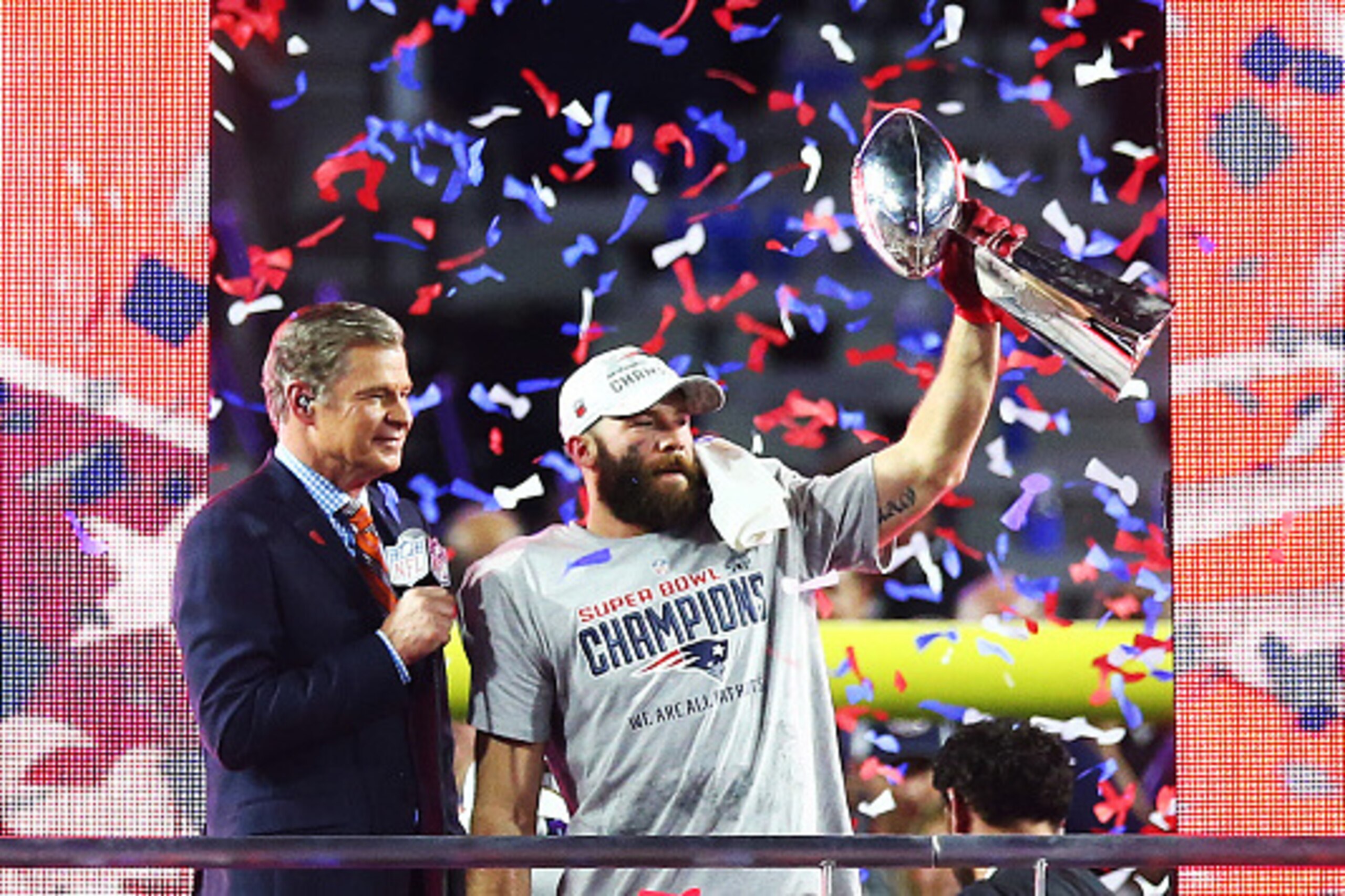 GLENDALE, AZ - FEBRUARY 01:   Julian Edelman #11 of the New England Patriots celebrates with the Vince Lombardi Trophy after defeating the Seattle Seahawks 28-24 to win Super Bowl XLIX at University of Phoenix Stadium on February 1, 2015 in Glendale, Ariz