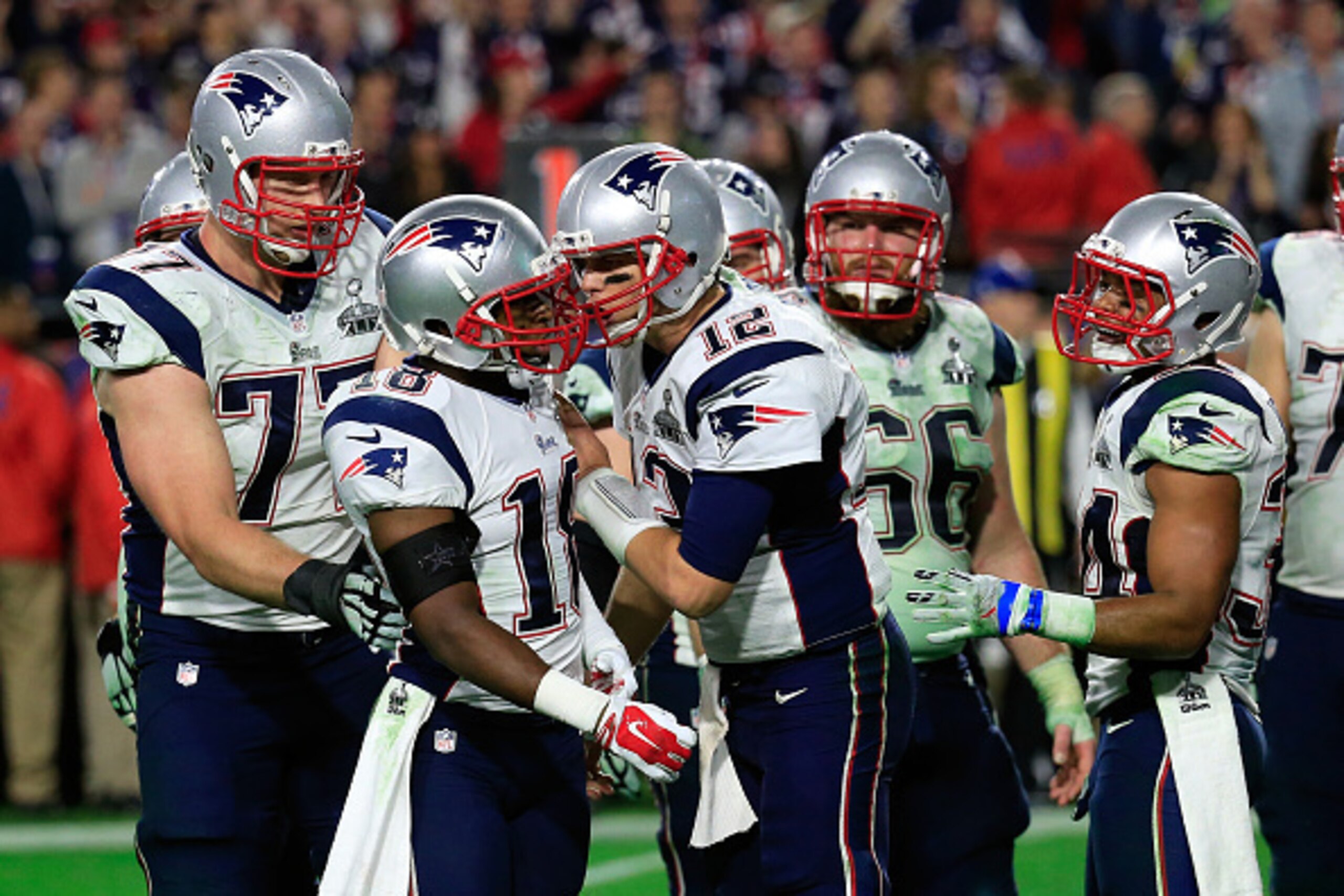 GLENDALE, AZ - FEBRUARY 01:   Tom Brady #12 talks to Matthew Slater #18 of the New England Patriots in the fourth quarter against the Seattle Seahawks during Super Bowl XLIX at University of Phoenix Stadium on February 1, 2015 in Glendale, Arizona.  (Phot