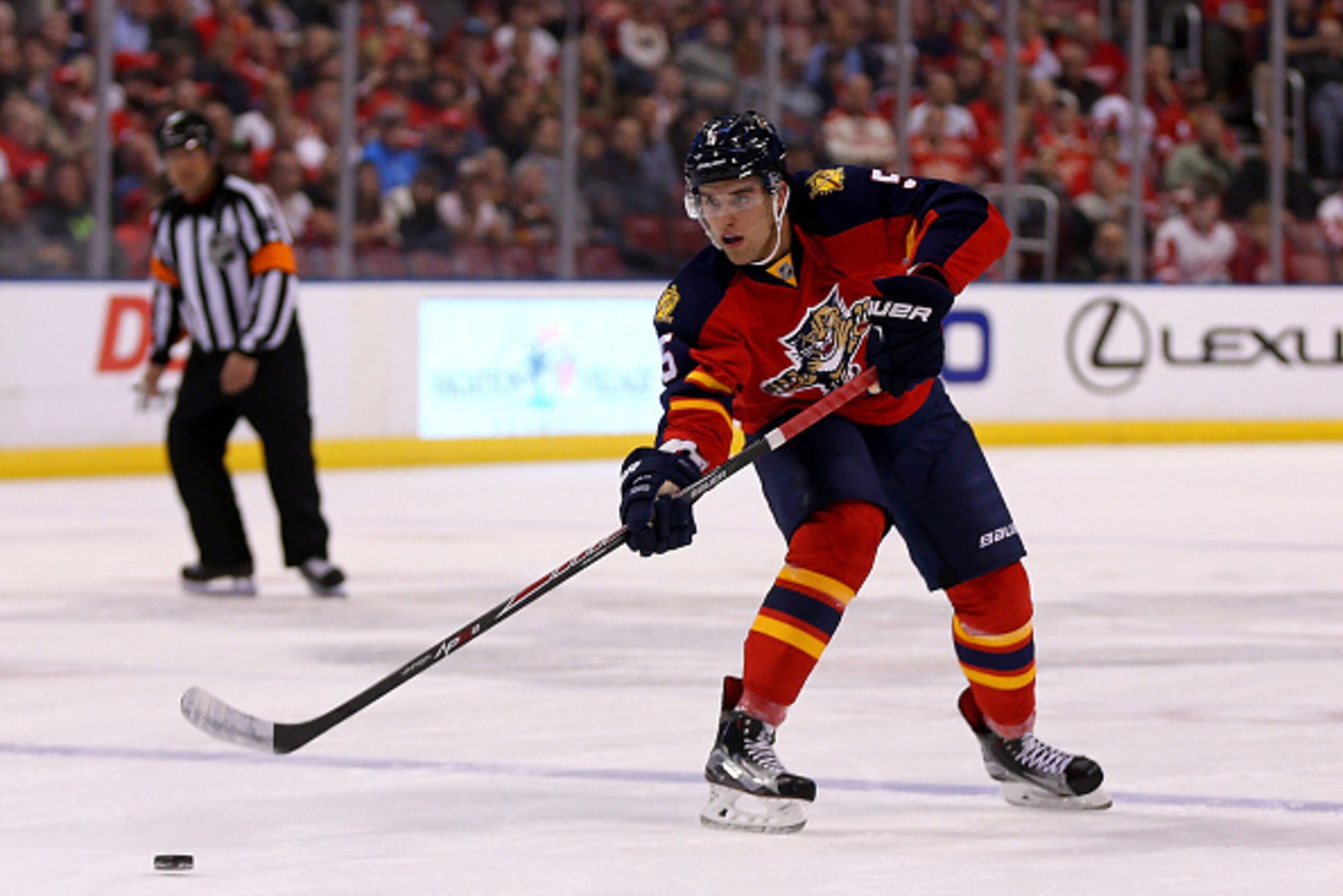 SUNRISE, FL - JANUARY 27:  Aaron Ekblad #5 of the Florida Panthers passes during a game against the Detroit Red Wings at BB&T Center on January 27, 2015 in Sunrise, Florida.  (Photo by Mike Ehrmann/Getty Images)