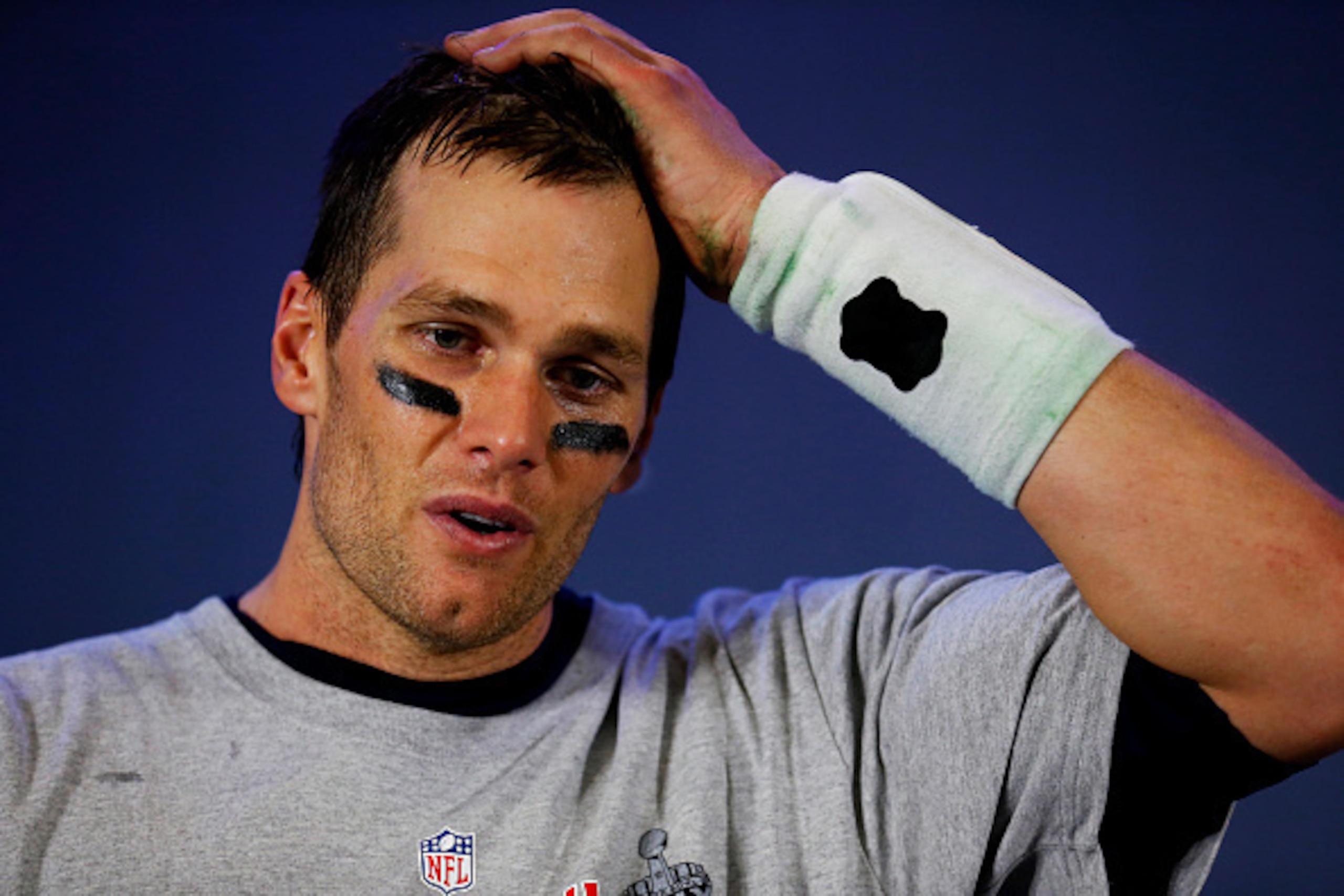 GLENDALE, AZ - FEBRUARY 01:  Tom Brady #12 of the New England Patriots talks to the media after winning Super Bowl XLIX 28-24 against the Seattle Seahawks at University of Phoenix Stadium on February 1, 2015 in Glendale, Arizona.  (Photo by Tom Pennington
