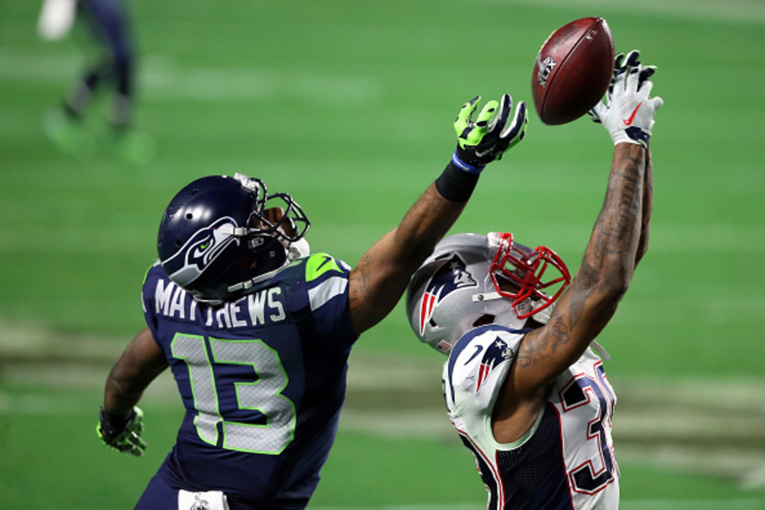 GLENDALE, AZ - FEBRUARY 01:  Brandon Browner #39 of the New England Patriots breaks up a pass intended for  Chris Matthews #13 of the Seattle Seahawks in the fourth quarter during Super Bowl XLIX at University of Phoenix Stadium on February 1, 2015 in Gle