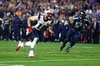Feb 1, 2015; Glendale, AZ, USA; New England Patriots wide receiver Julian Edelman (11) runs against the Seattle Seahawks in the fourth quarter in Super Bowl XLIX at University of Phoenix Stadium. Mandatory Credit: Mark J. Rebilas-USA TODAY Sports
